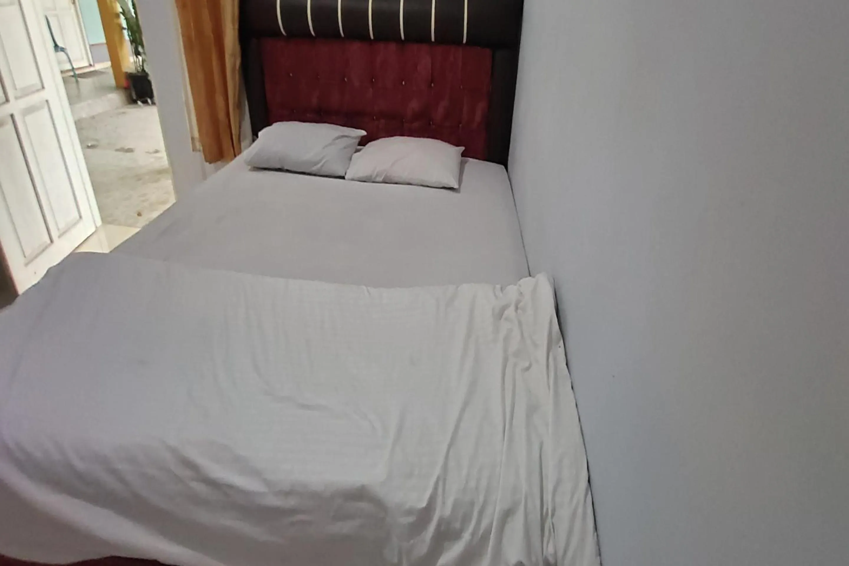 Bedroom, Bed in Hotel O Homestay Citra