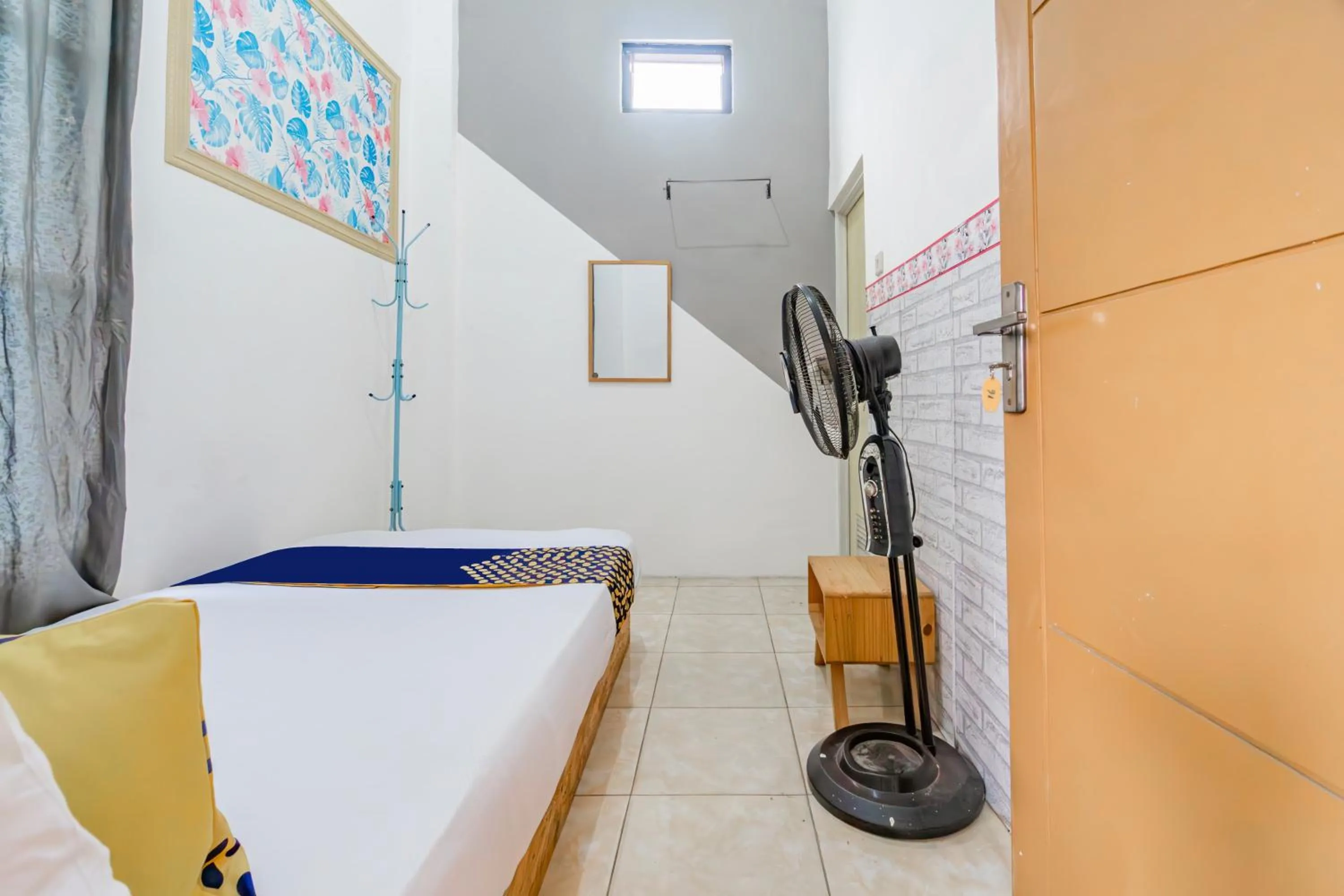 Bedroom in Hotel O Ita Homestay Syariah