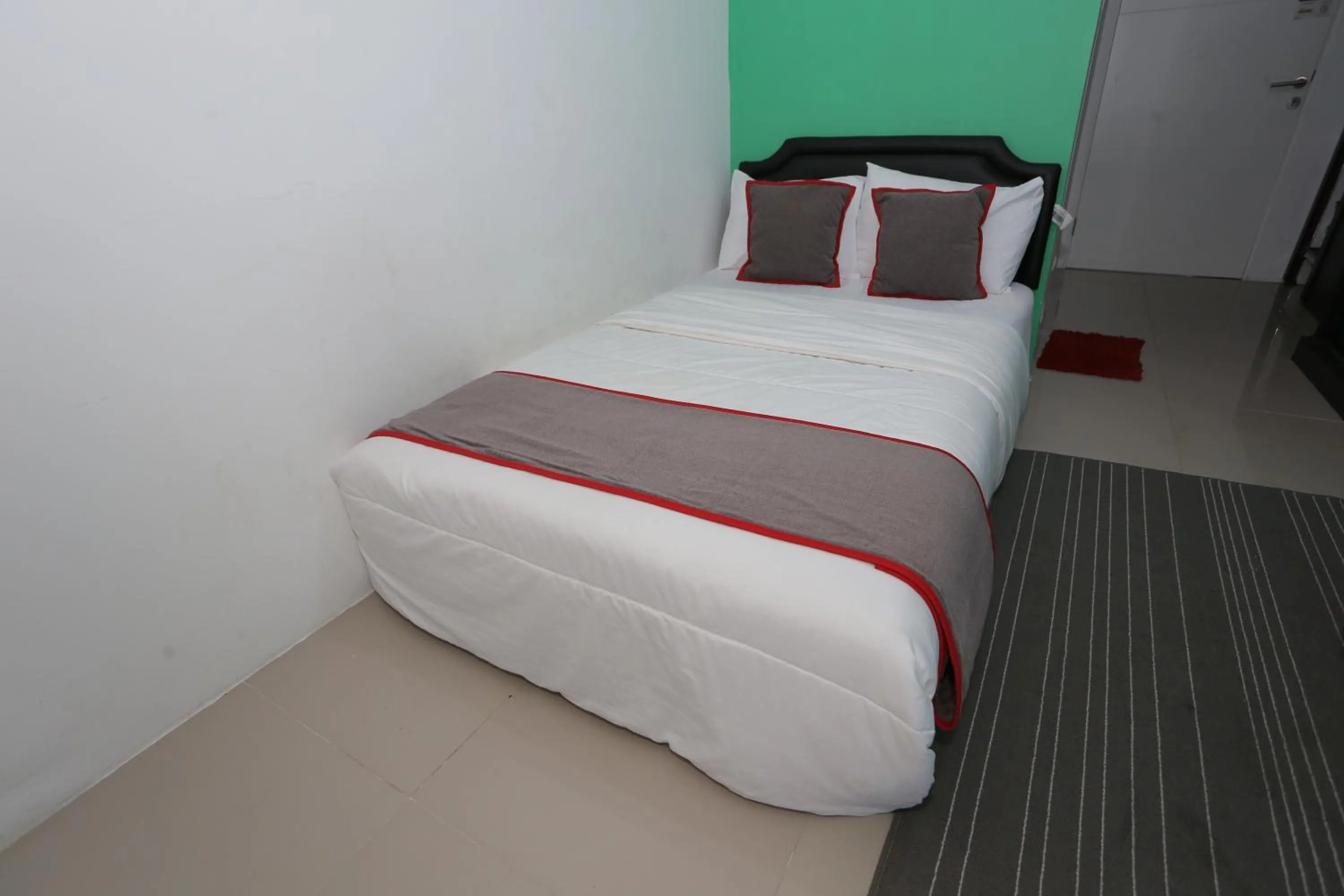 Bedroom in Collection O 93750 Luxury Rooms @ Urbantown Serpong