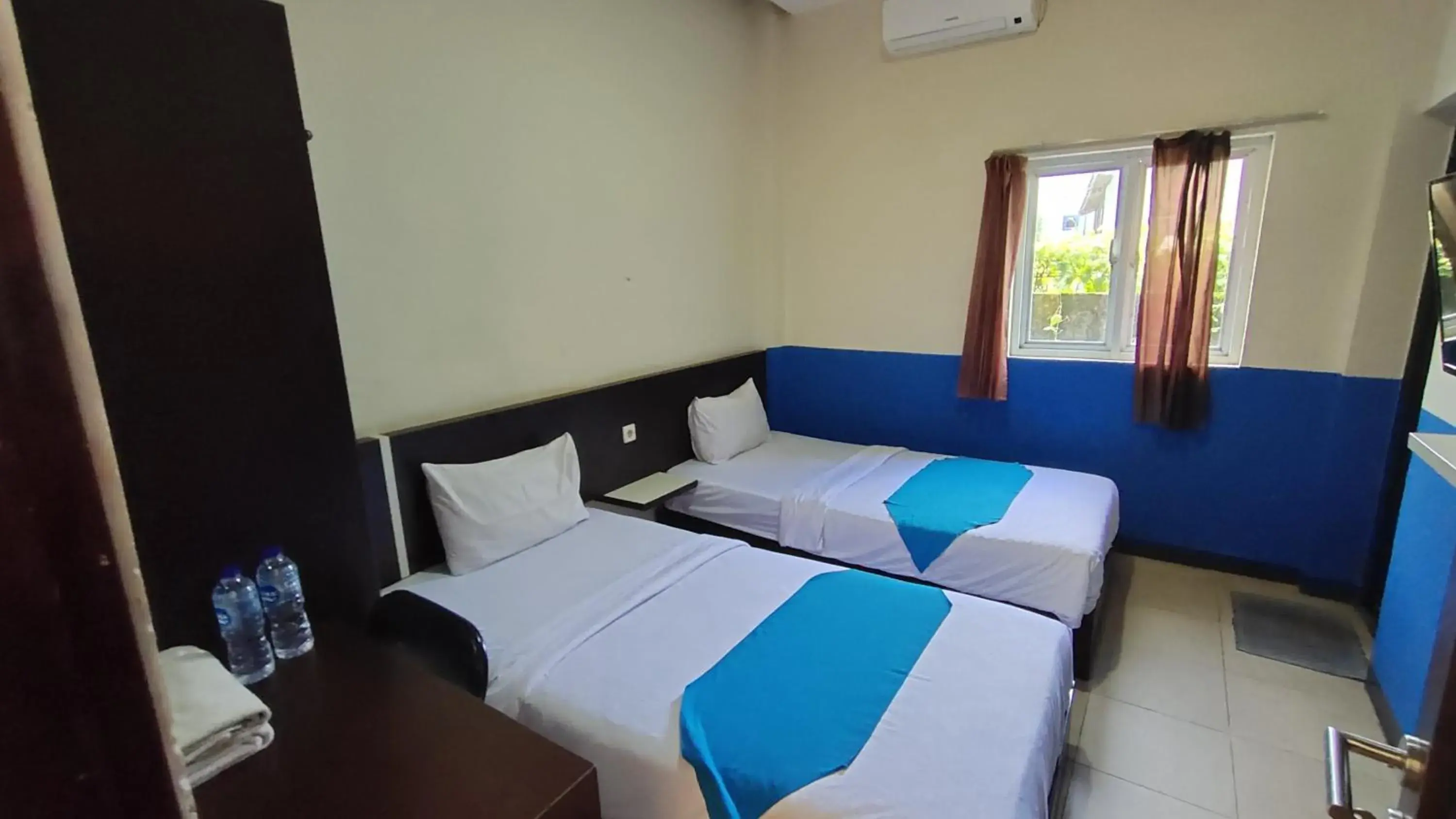 Standard Twin Room in Hotel O Nilam Guest HouseNearYani Heahlerr Standard Twin Room in Hotel O Nilam Guest HouseNearYani Heahlerr