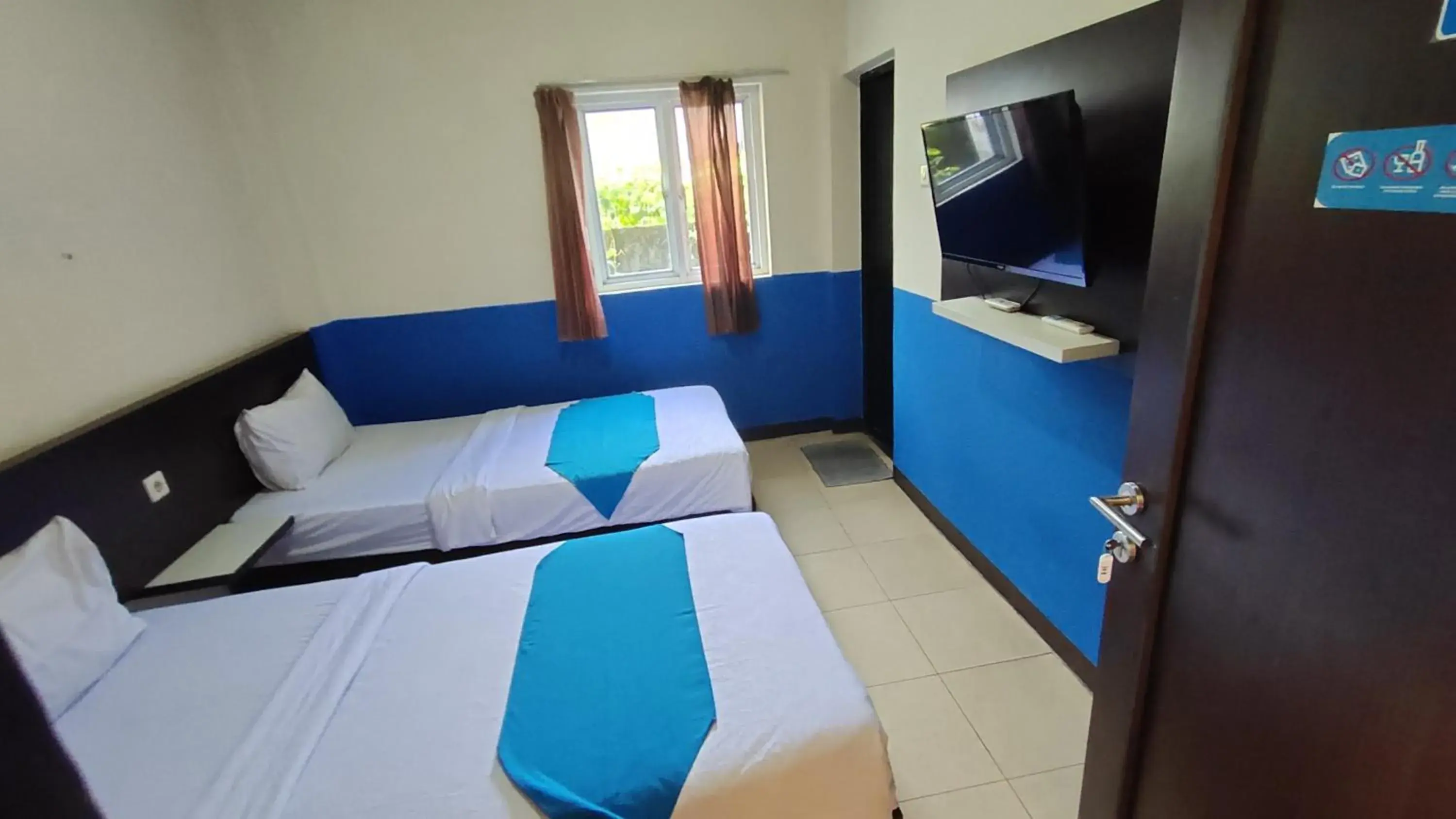 Standard Twin Room in Hotel O Nilam Guest HouseNearYani Heahlerr Standard Twin Room in Hotel O Nilam Guest HouseNearYani Heahlerr