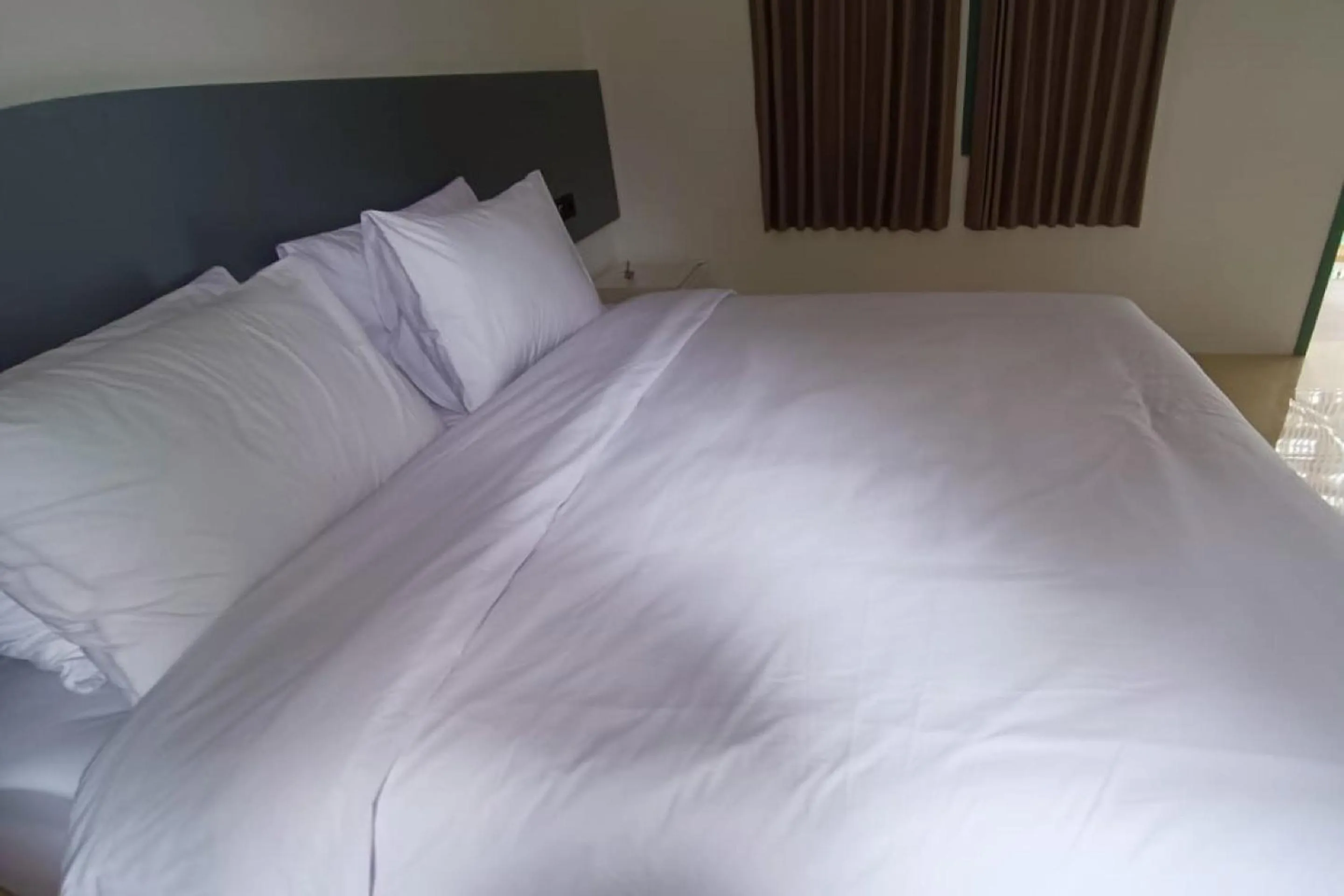 Bedroom, Bed in Hotel O Bumi Tenang Homestay