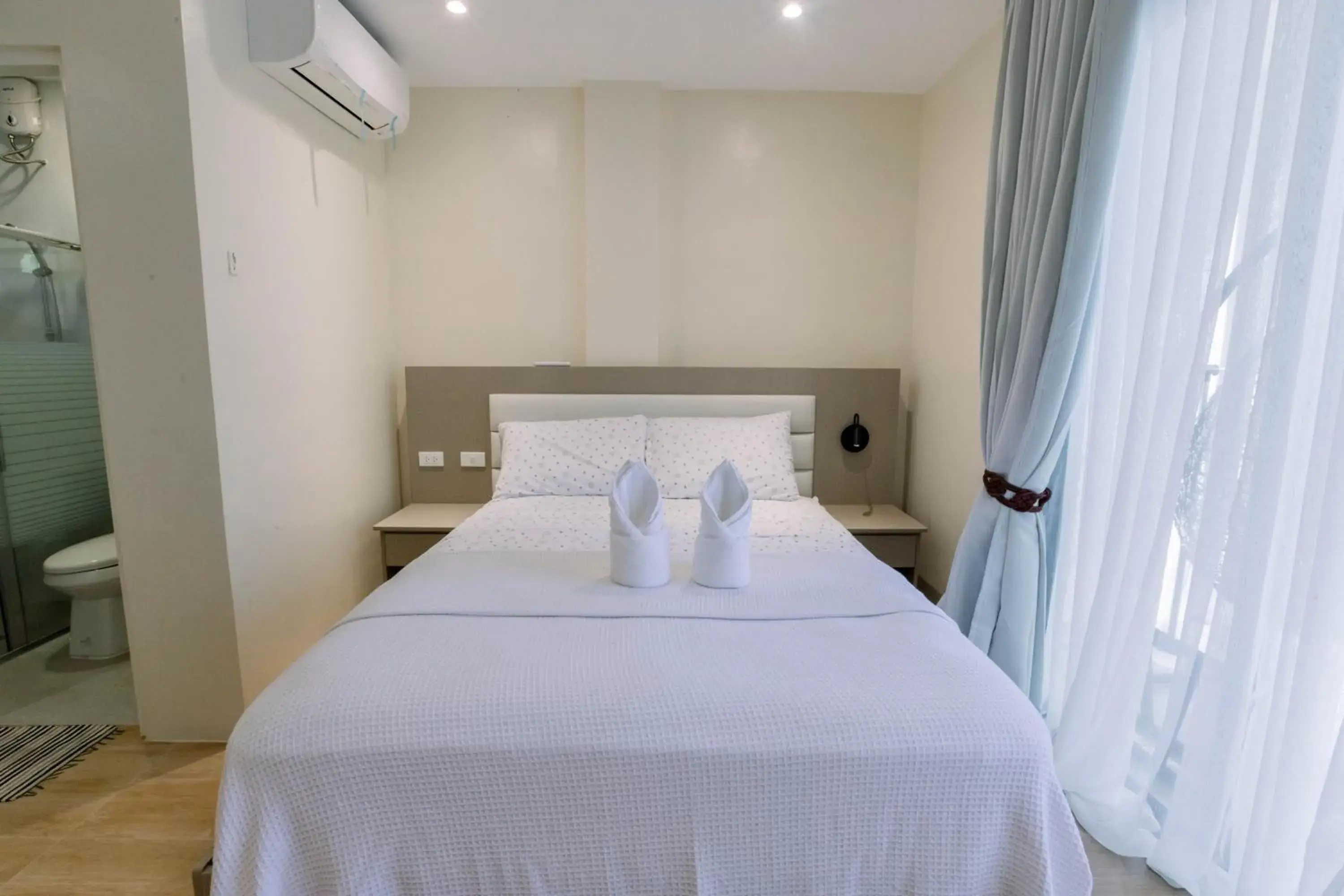 Bed in Sonrisa Resort De Playa by Hiverooms Bed in Sonrisa Resort De Playa by Hiverooms