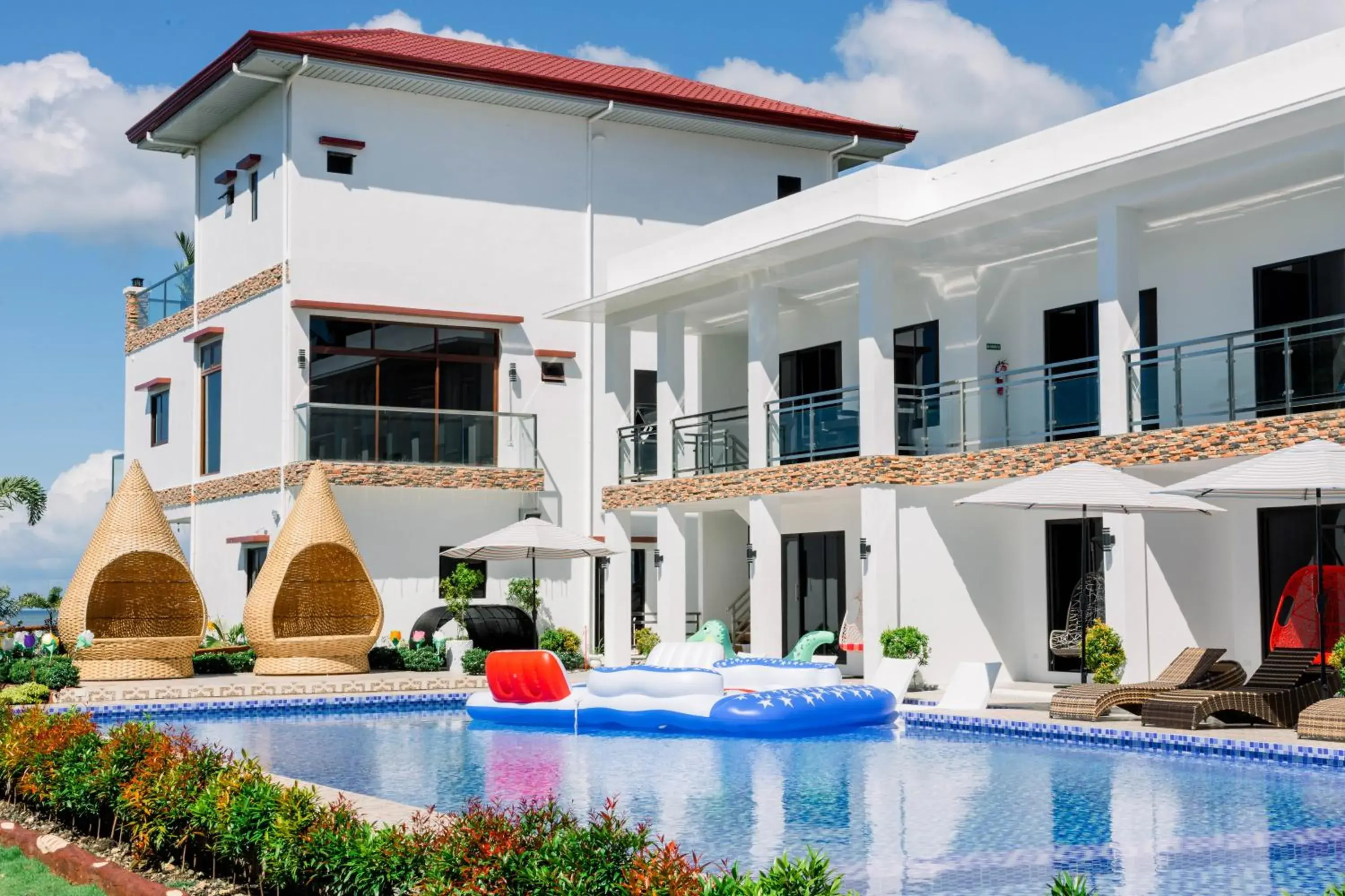 Property building in Sonrisa Resort De Playa by Hiverooms Property building in Sonrisa Resort De Playa by Hiverooms