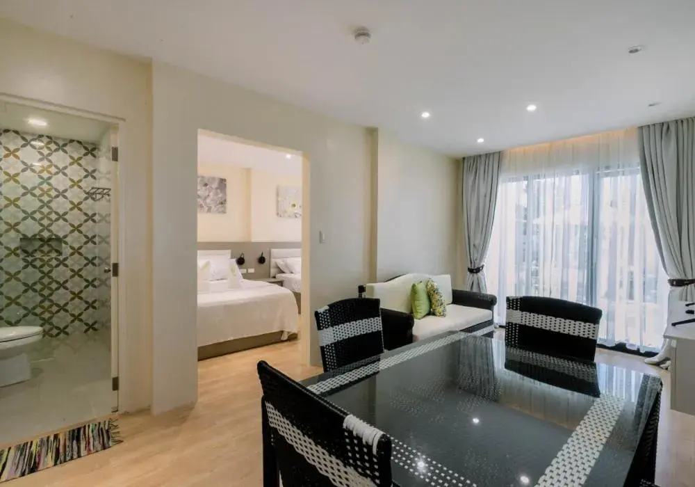 Bed in Sonrisa Resort De Playa by Hiverooms Bed in Sonrisa Resort De Playa by Hiverooms