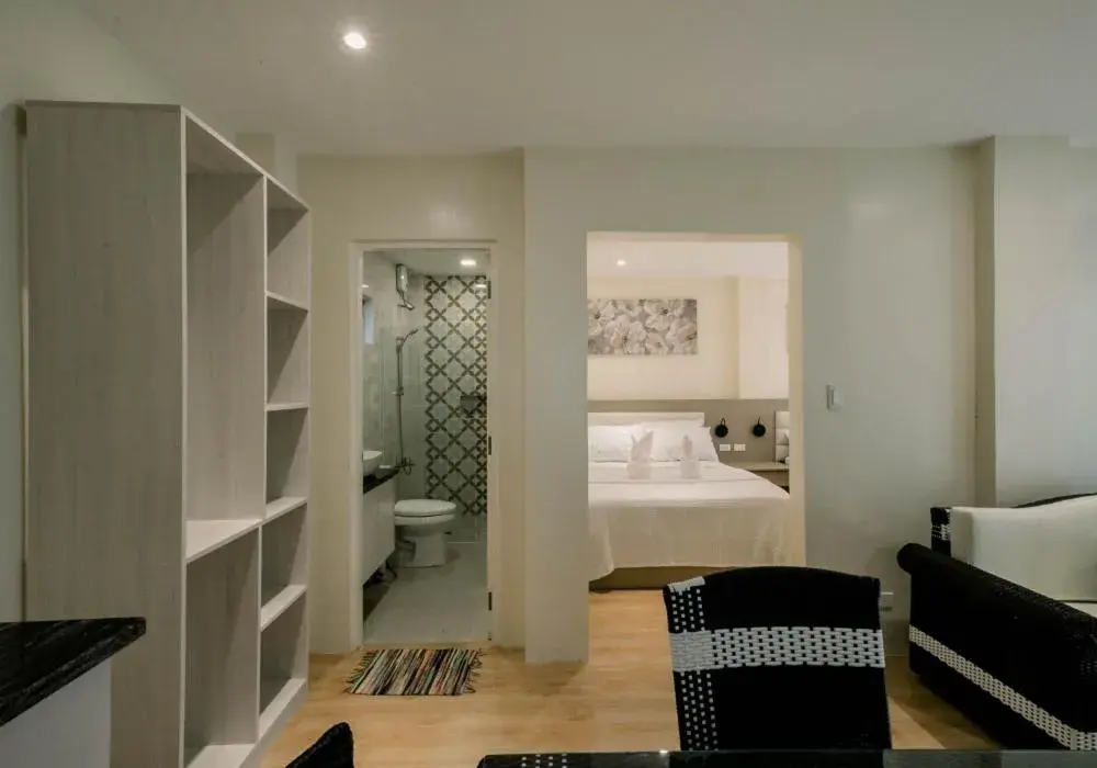 Bed in Sonrisa Resort De Playa by Hiverooms Bed in Sonrisa Resort De Playa by Hiverooms