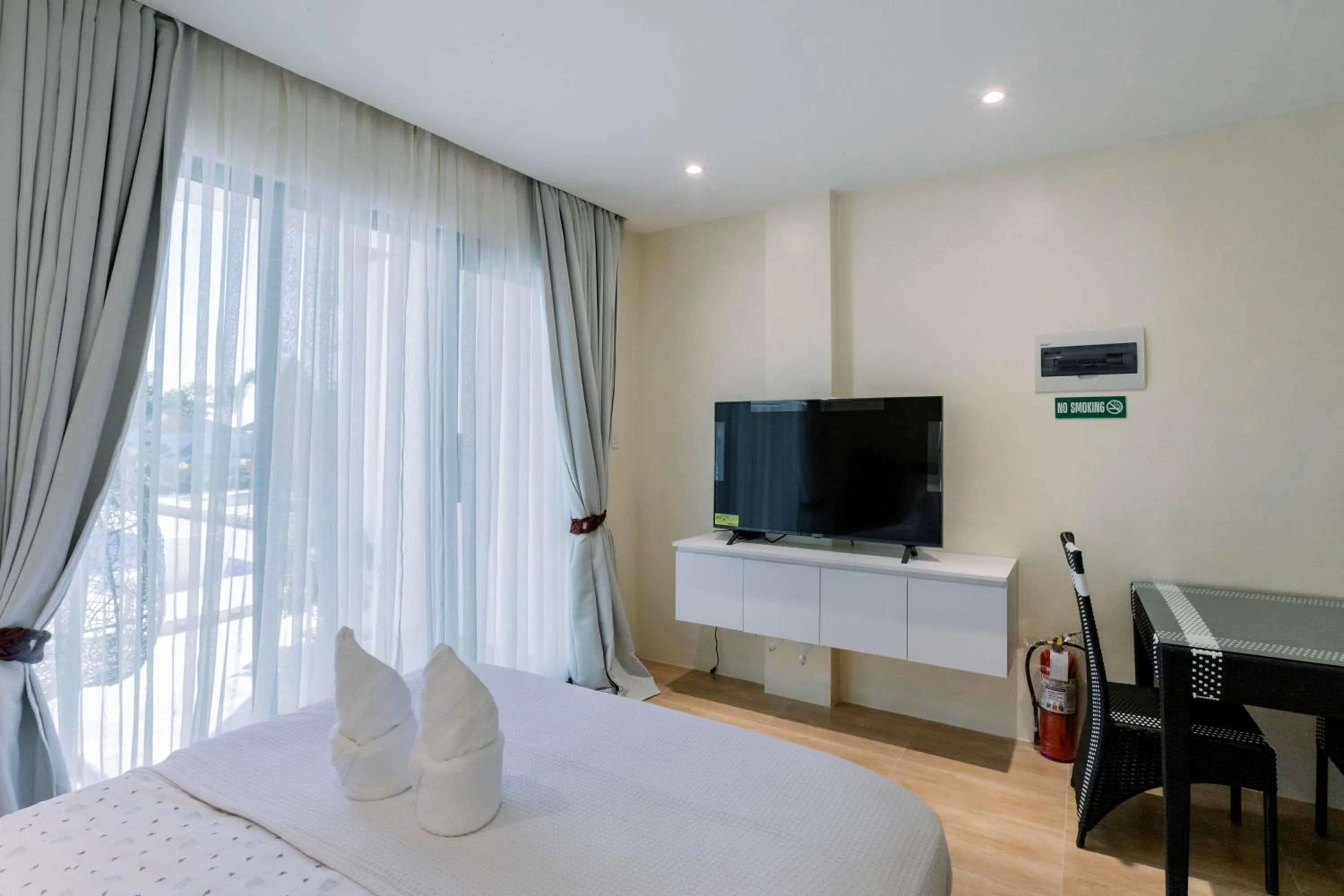 Bed in Sonrisa Resort De Playa by Hiverooms