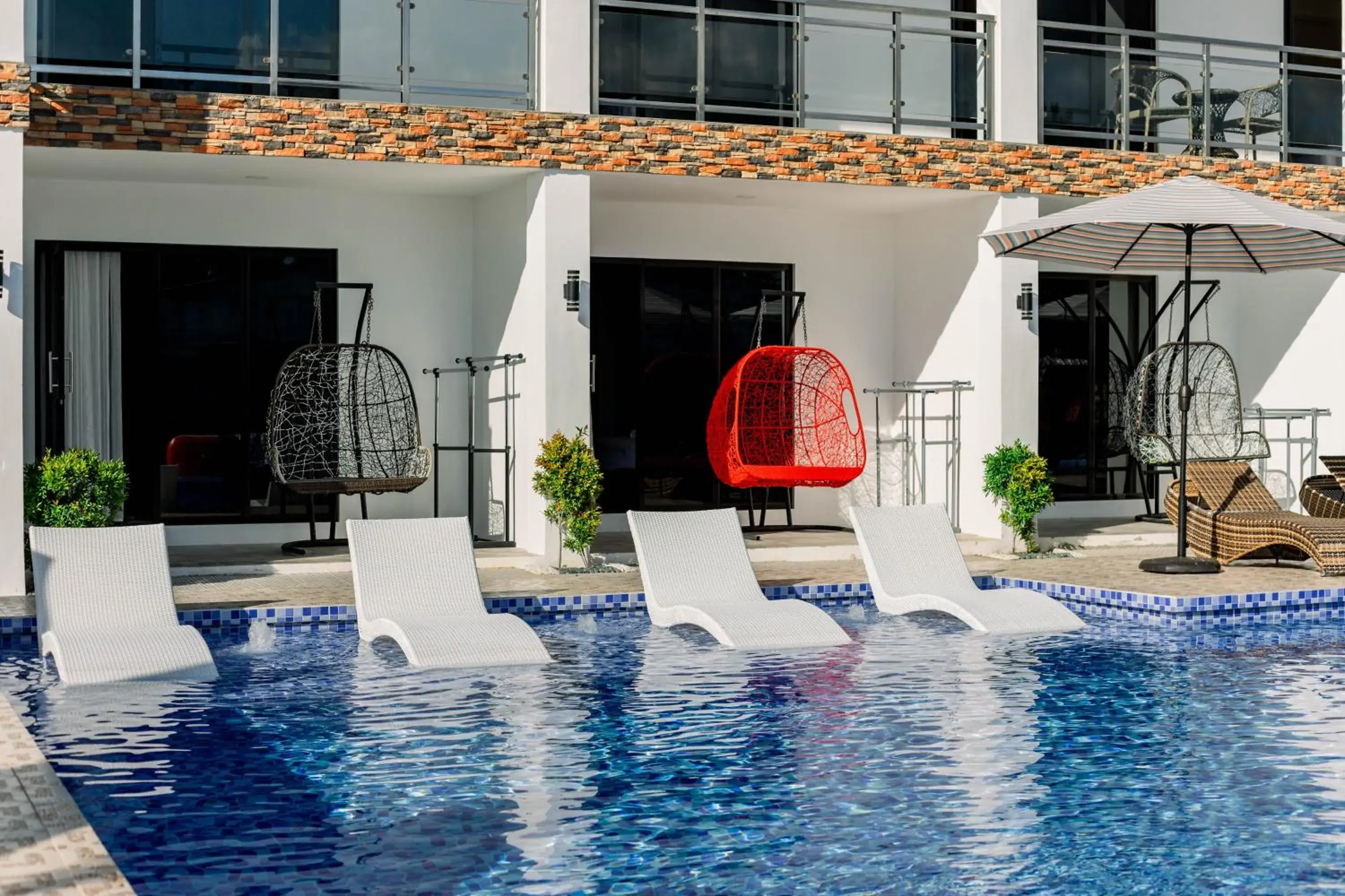 Property building in Sonrisa Resort De Playa by Hiverooms Property building in Sonrisa Resort De Playa by Hiverooms