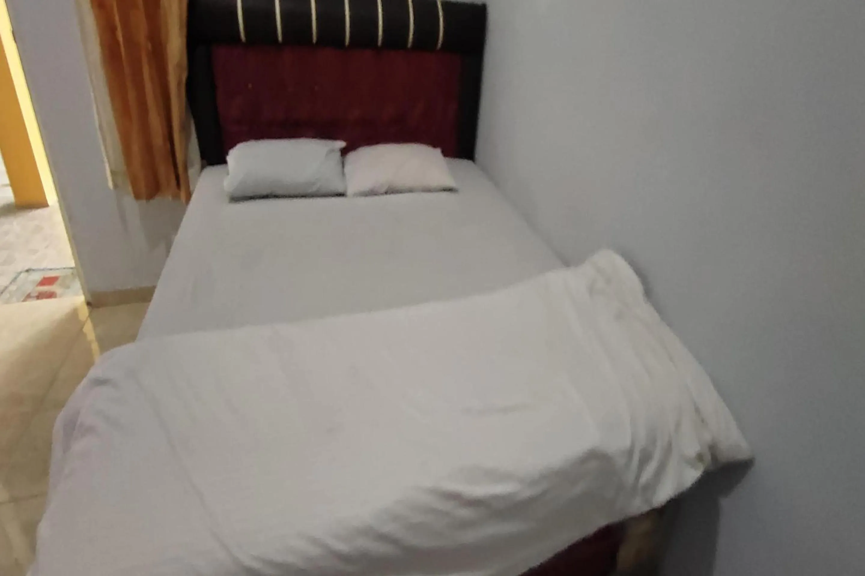 Bedroom, Bed in Hotel O Penginapan Naya Rita