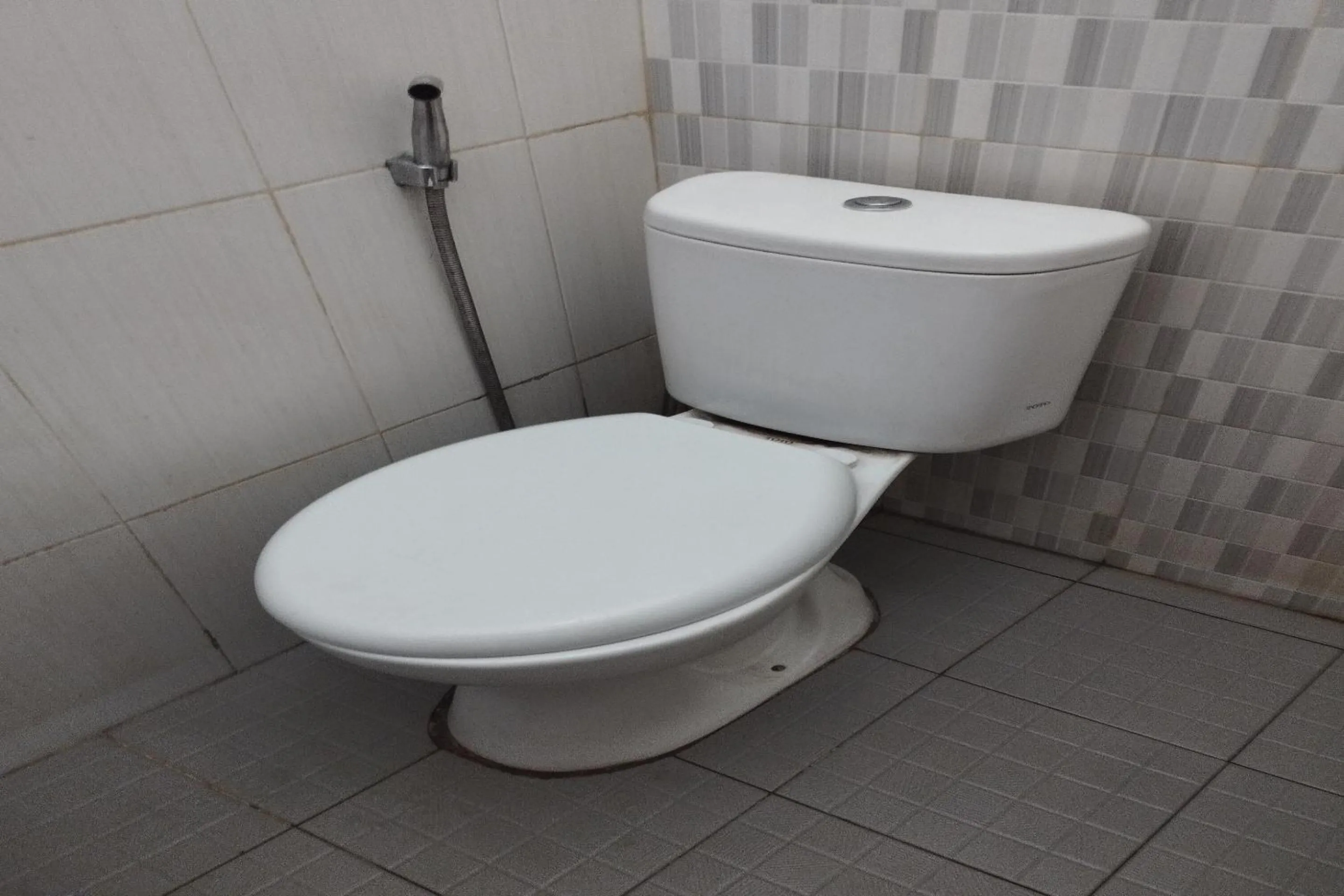 Bathroom in Hotel O Penginapan Naya Rita