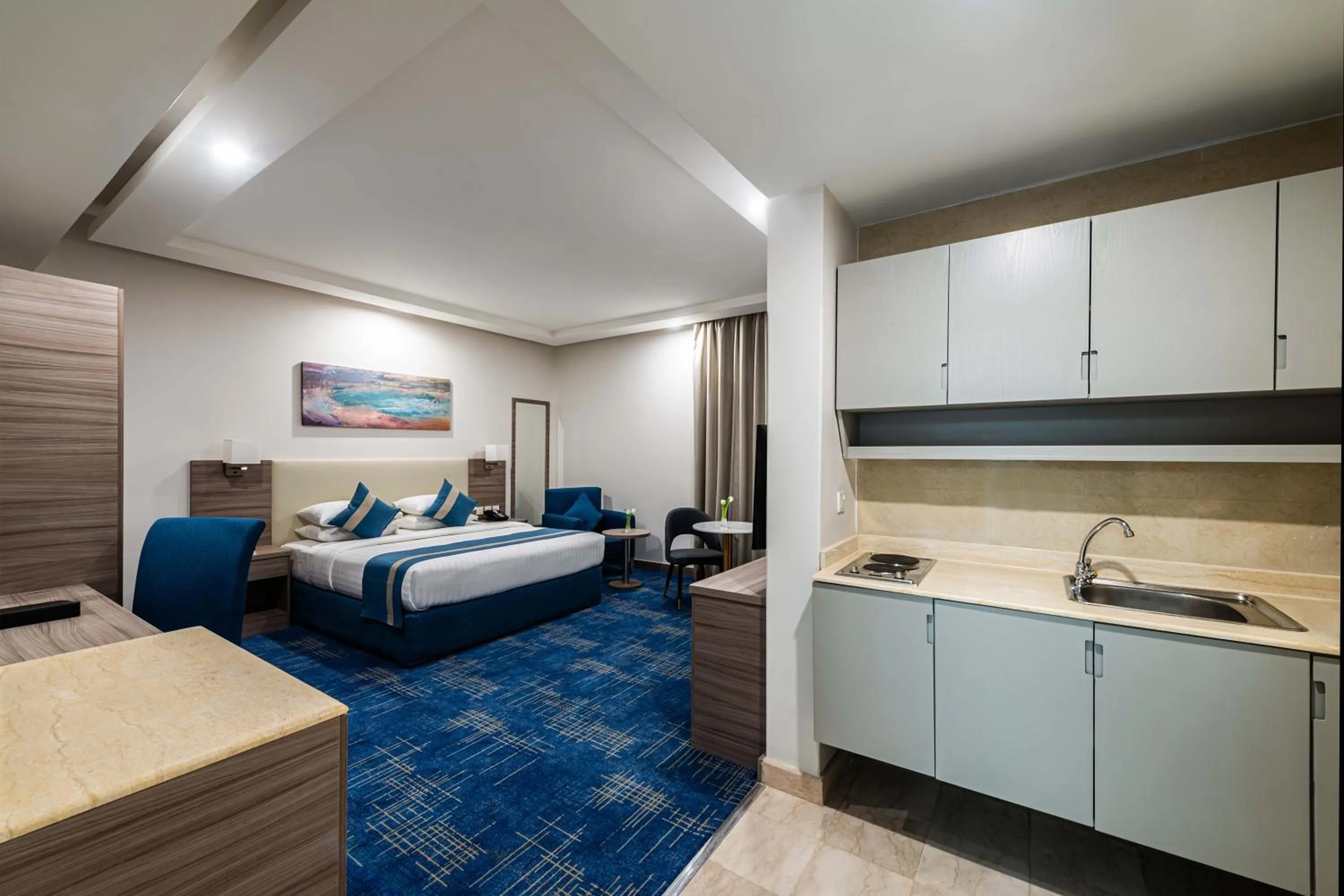 Kitchen or kitchenette, Bed in Best Western Plus Tabuk City Center