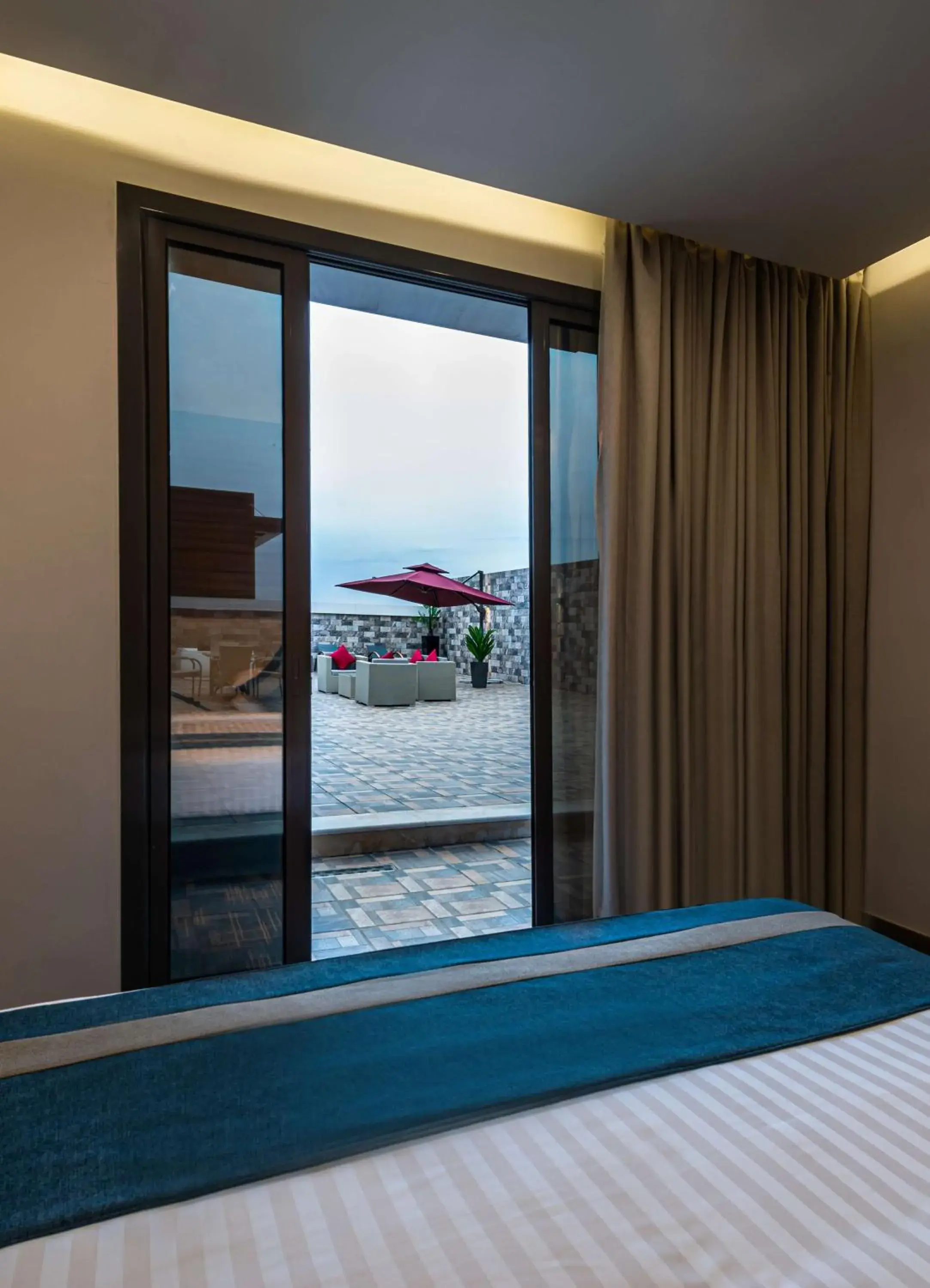 View (from property/room), Bed in Best Western Plus Tabuk City Center View (from property/room), Bed in Best Western Plus Tabuk City Center