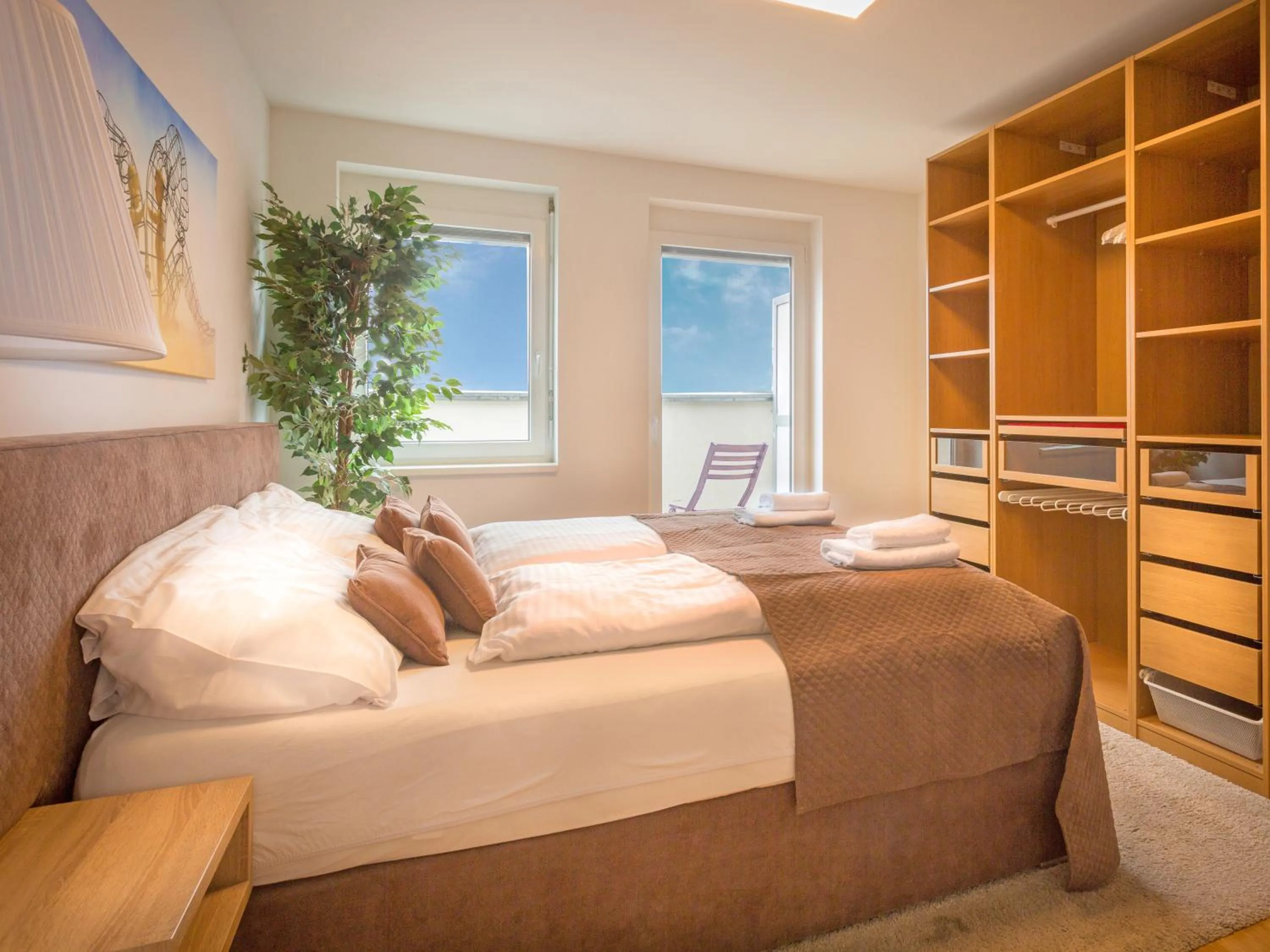 Bedroom, Bed in Penthouse Apartments