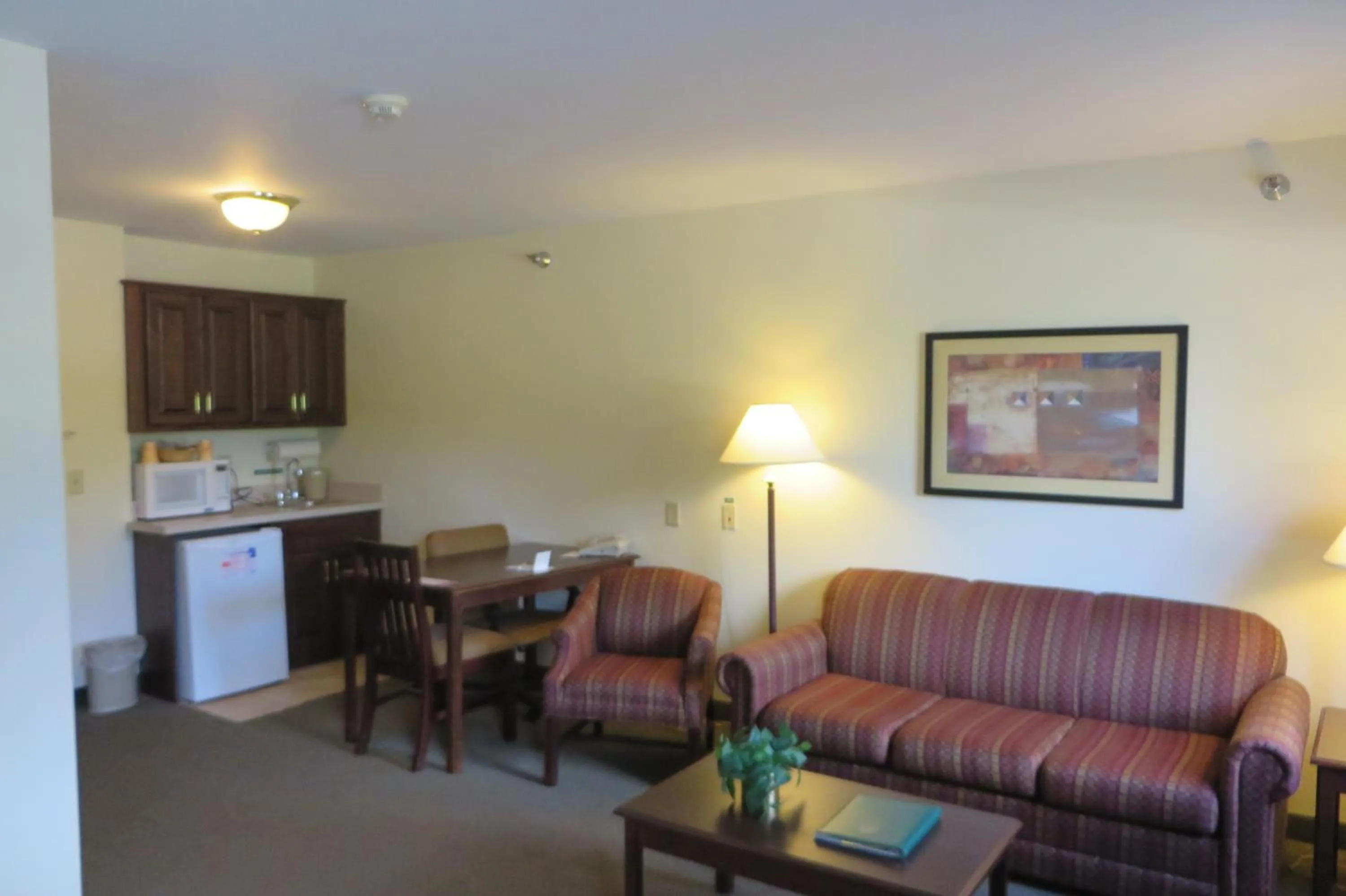 Living room in Hawthorn Extended Stay by Wyndham Seville