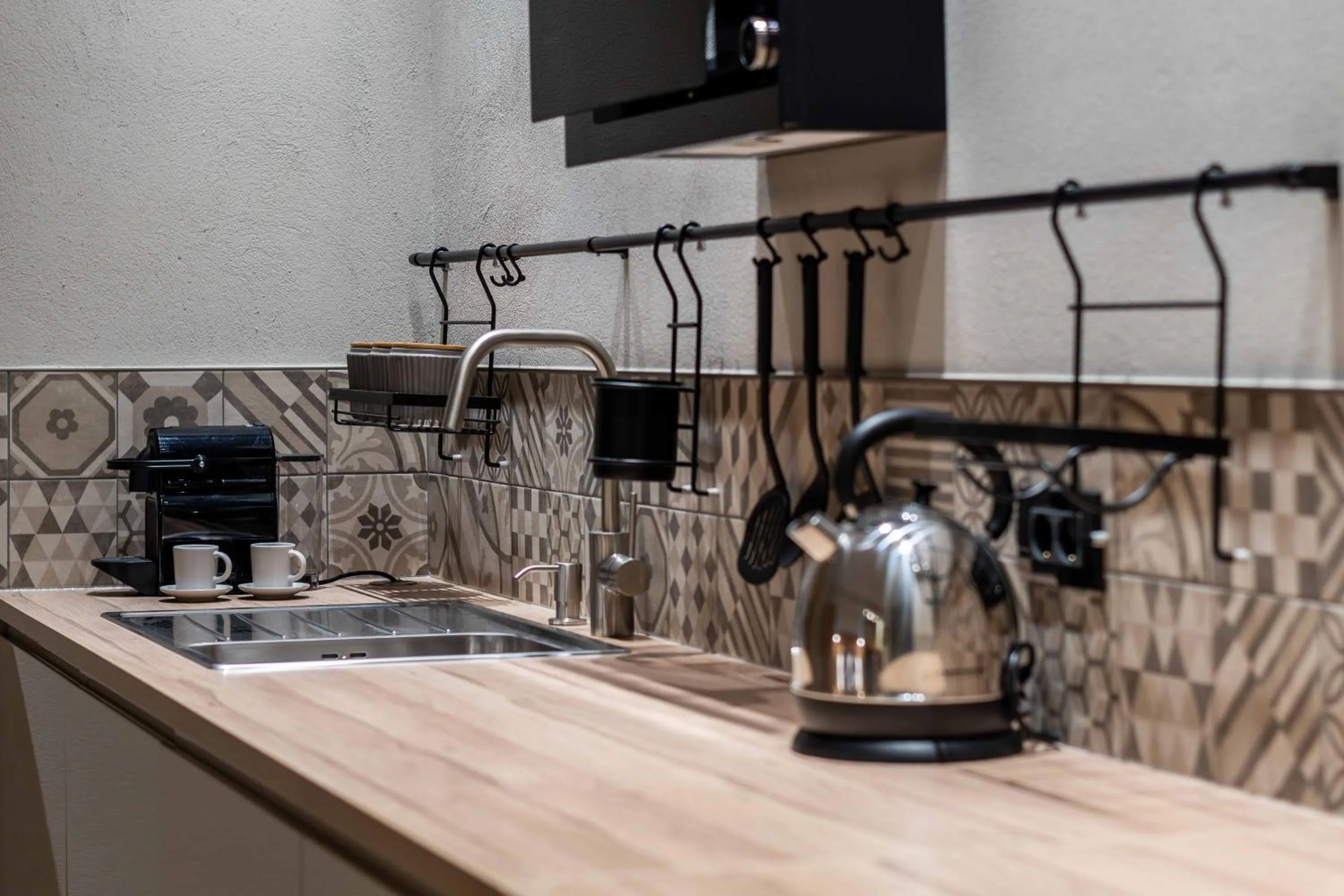 Kitchen or kitchenette in Maison Bucarest Apartments by Olala Homes