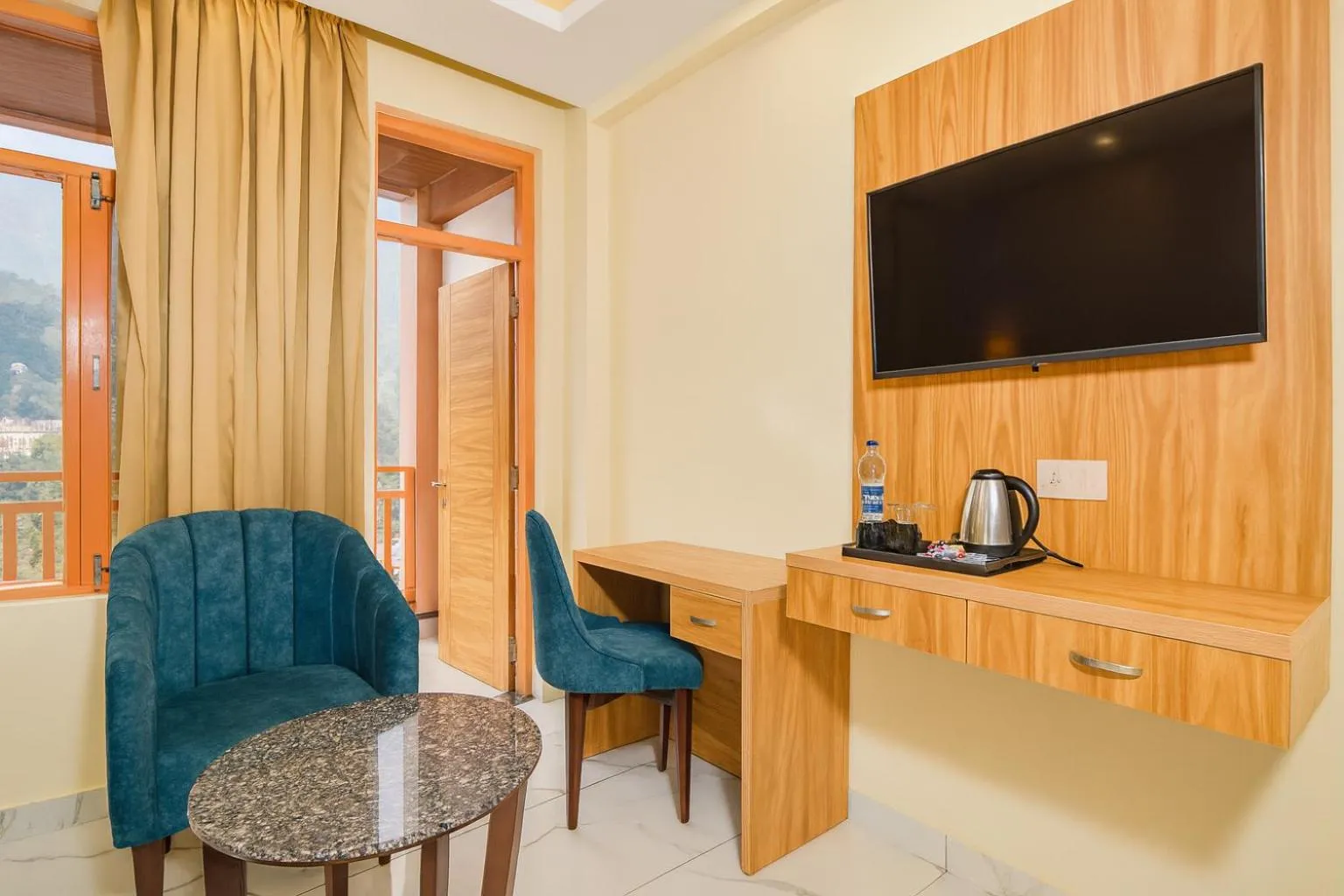 Bedroom in Hotel Pawan Regency- Best Mountain View Hotel In McLeodganj