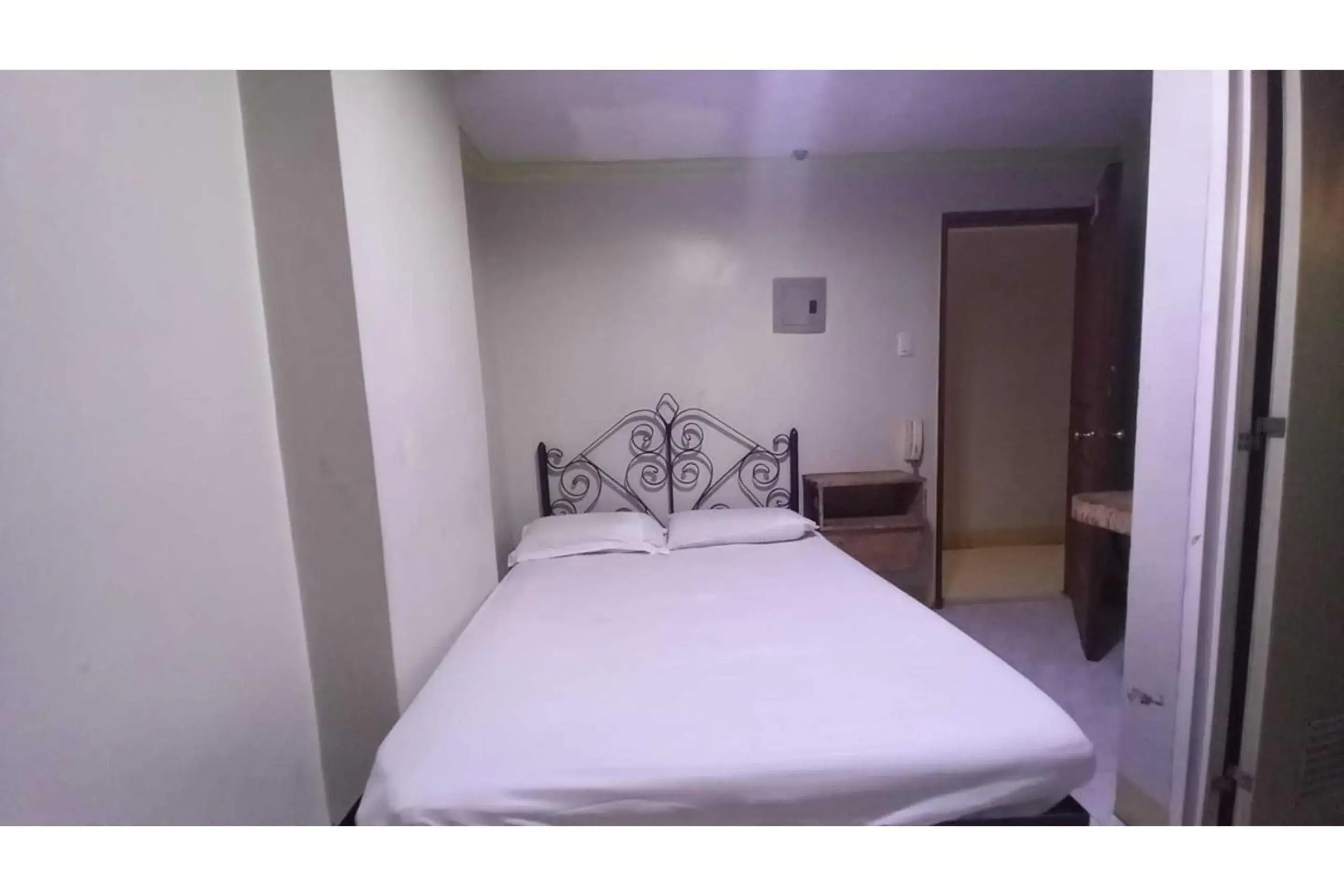 Bedroom, Bed in OYO 1066 Dorotello Apartelle Bedroom, Bed in OYO 1066 Dorotello Apartelle