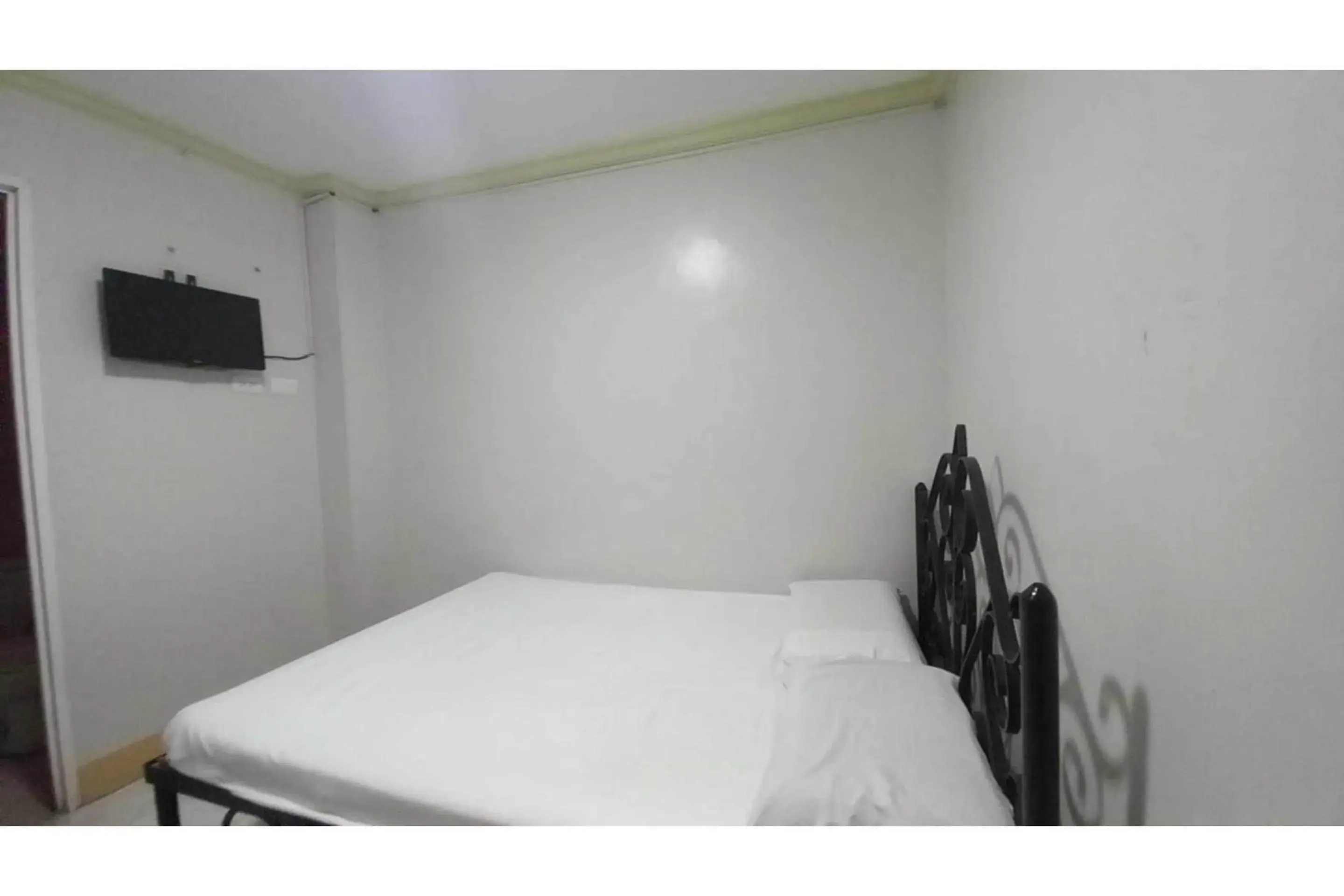 Bedroom, Bed in OYO 1066 Dorotello Apartelle Bedroom, Bed in OYO 1066 Dorotello Apartelle