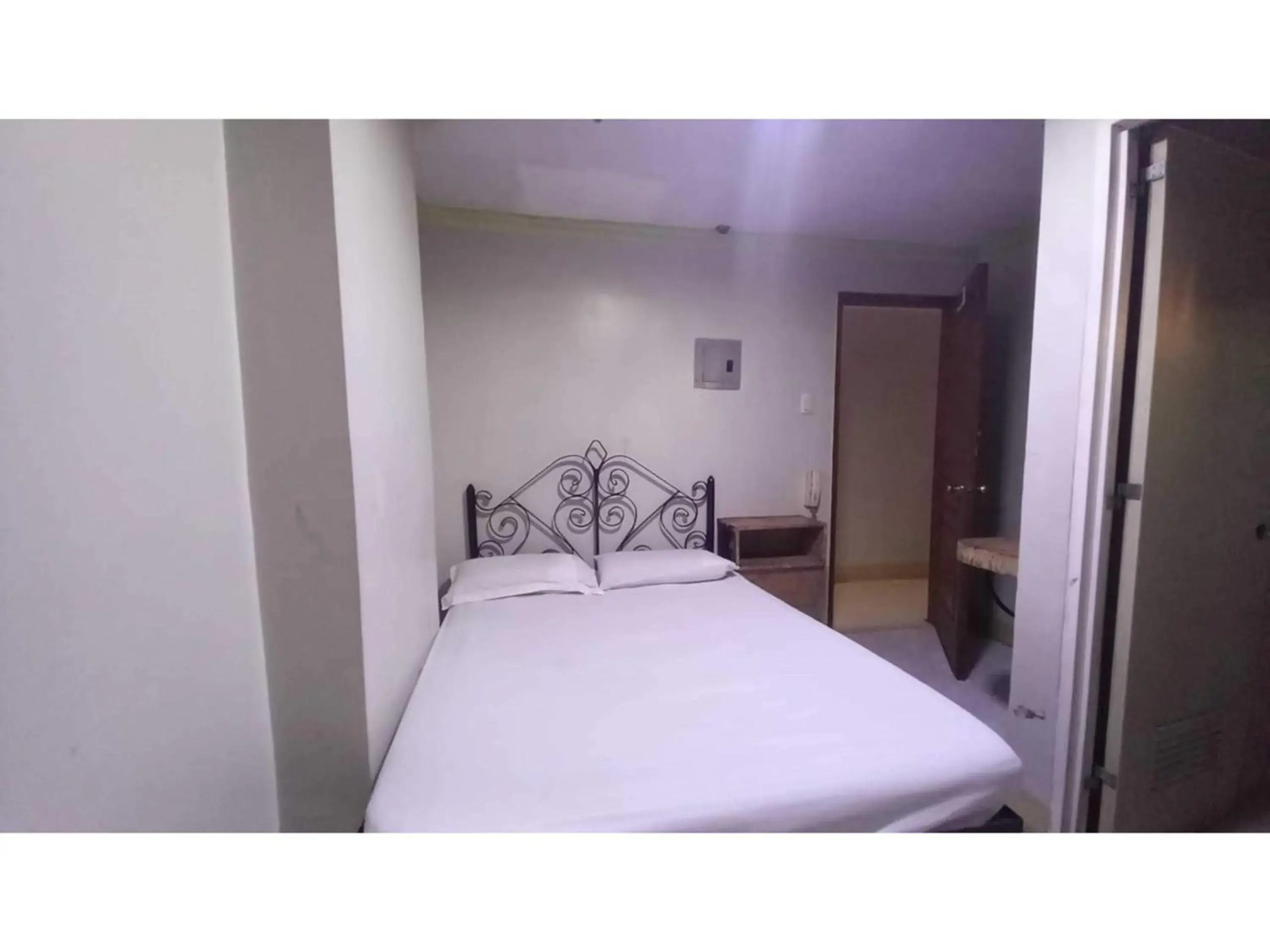 Bedroom, Bed in OYO 1066 Dorotello Apartelle Bedroom, Bed in OYO 1066 Dorotello Apartelle