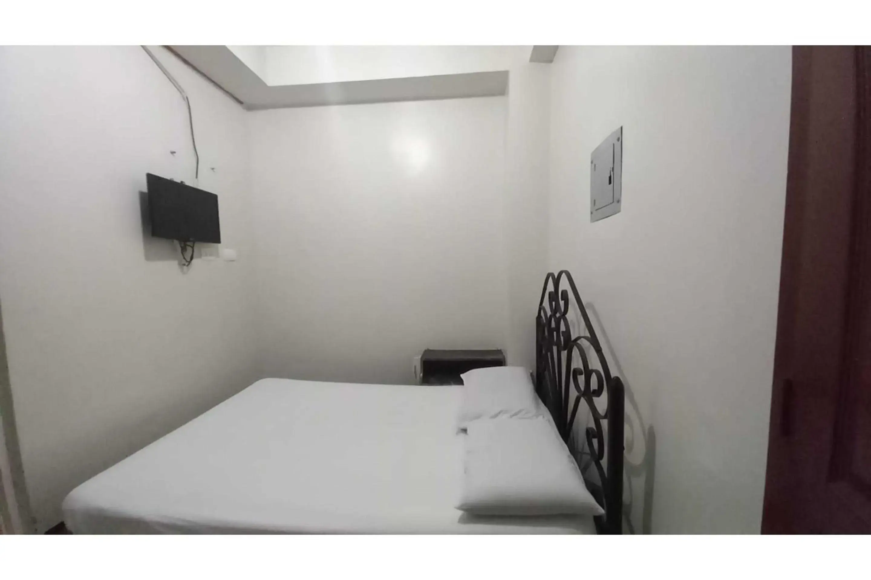 Bedroom, Bed in OYO 1066 Dorotello Apartelle Bedroom, Bed in OYO 1066 Dorotello Apartelle