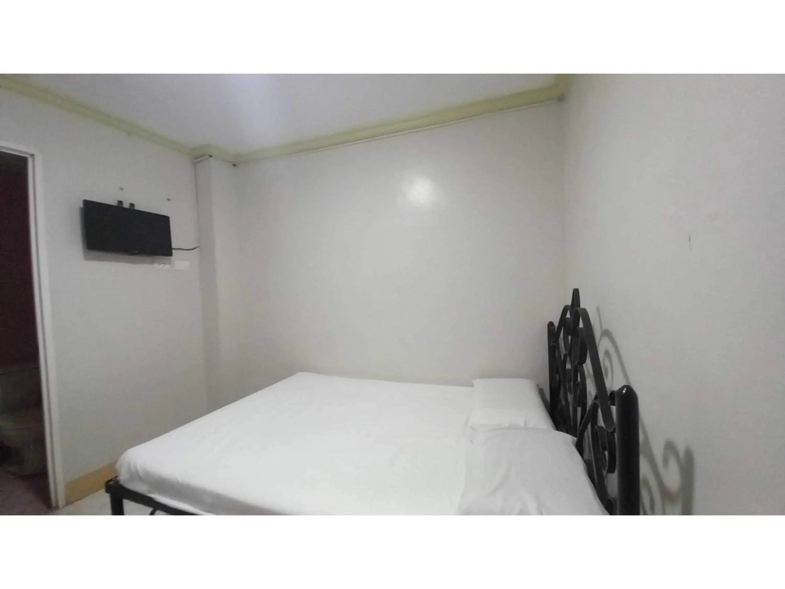 Bedroom, Bed in OYO 1066 Dorotello Apartelle Bedroom, Bed in OYO 1066 Dorotello Apartelle