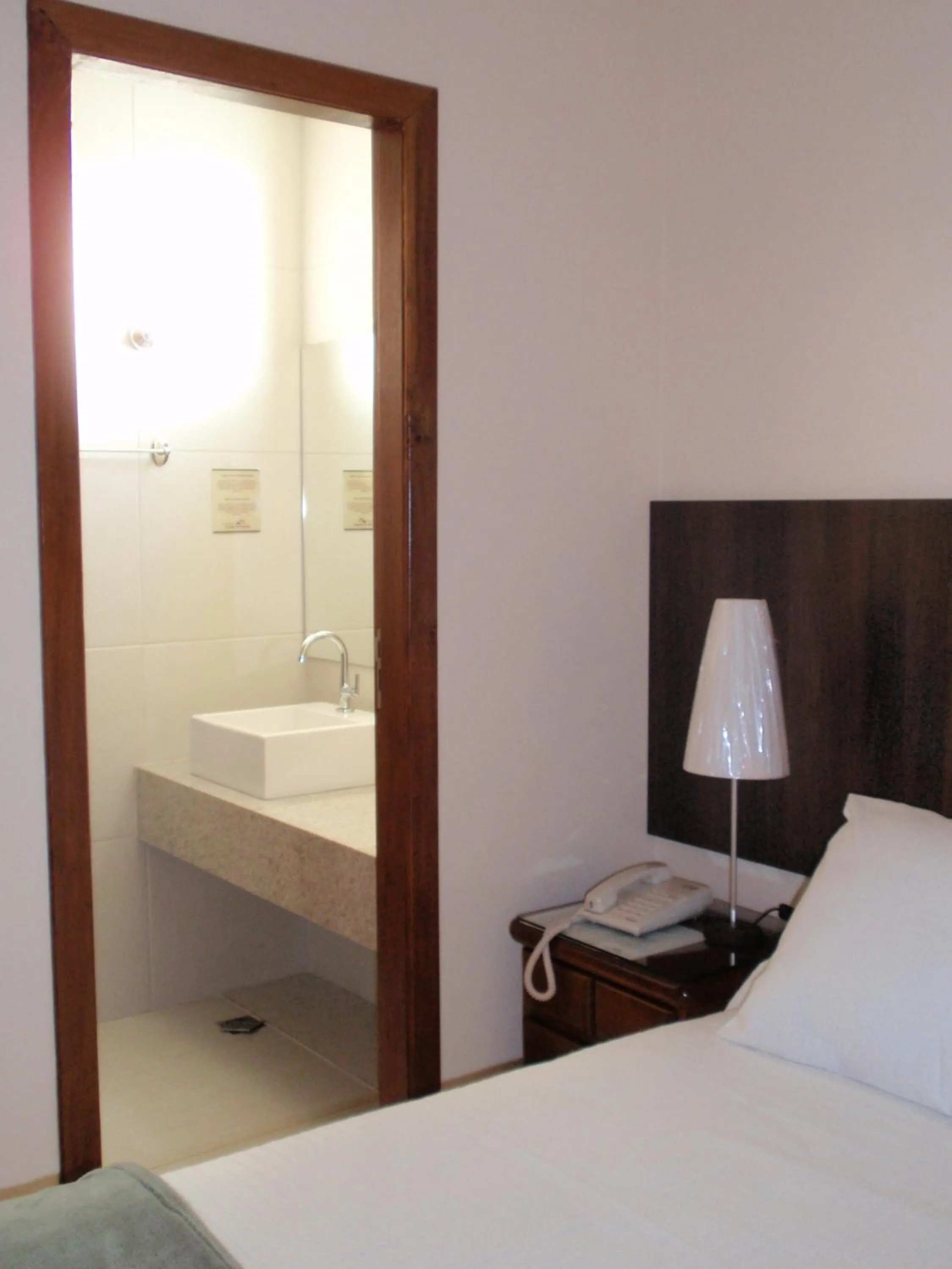 Toilet, Bed in Pousada Sossego da Pampulha