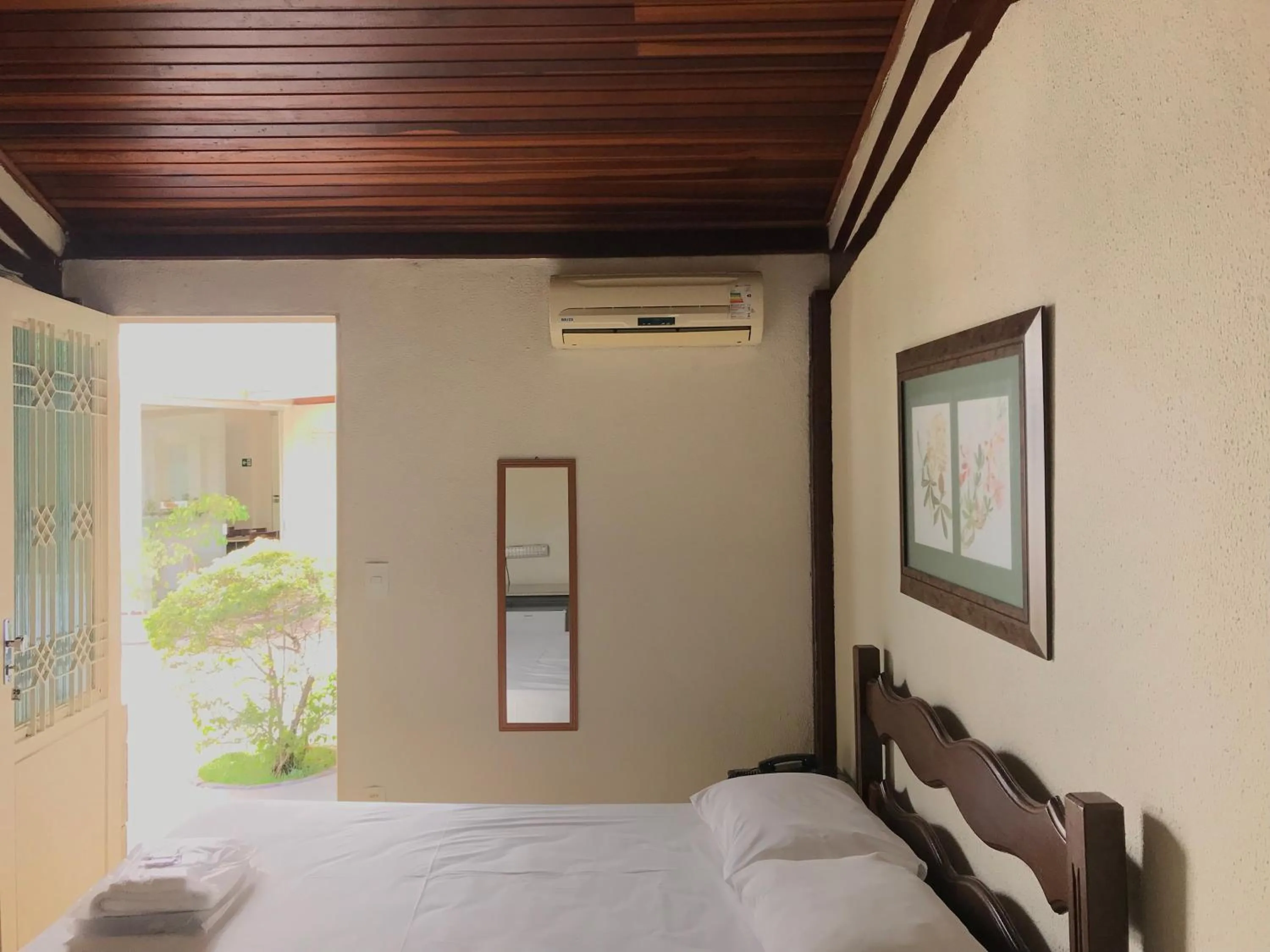 Bedroom, Bed in Pousada Sossego da Pampulha