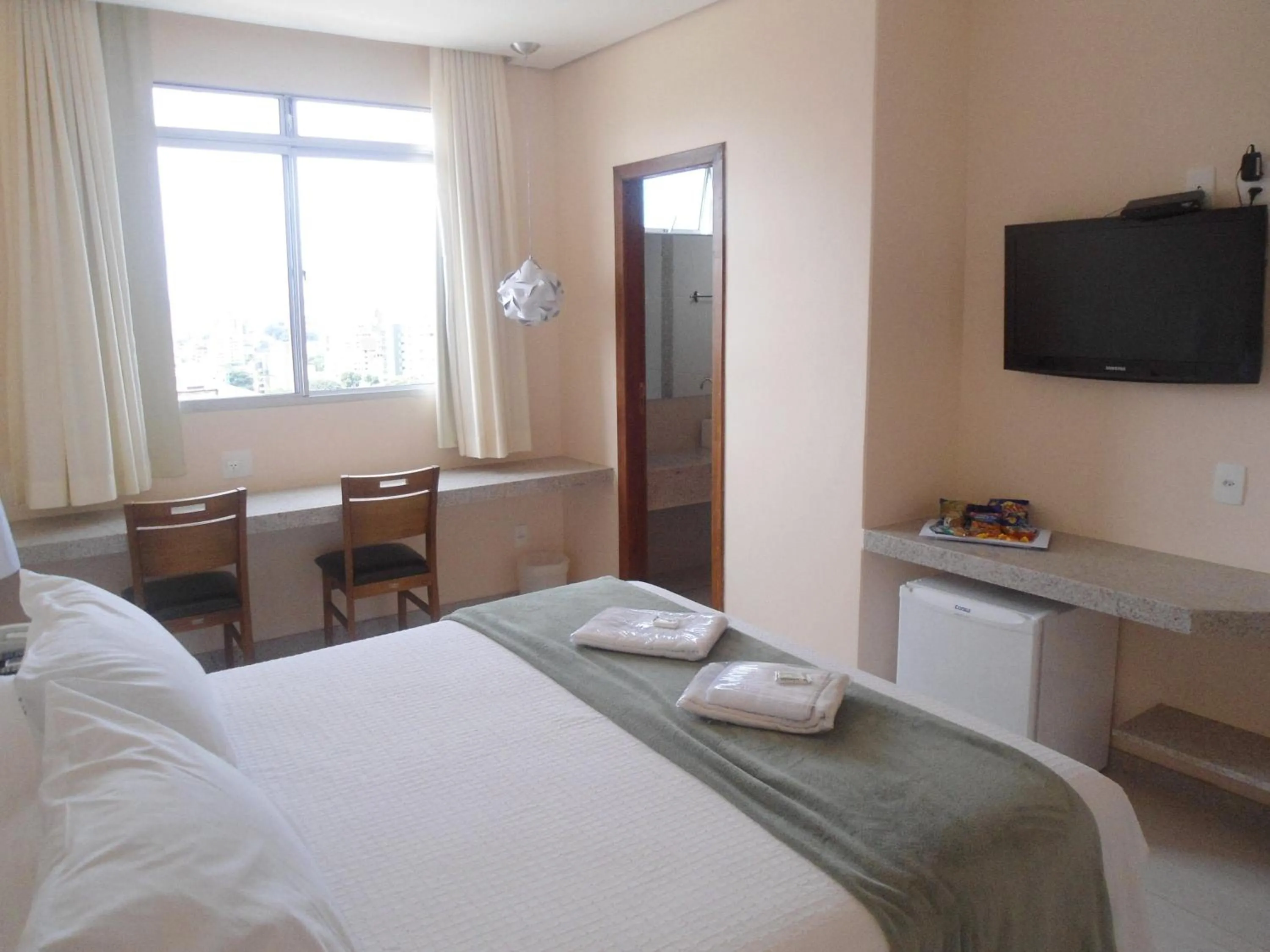 Photo of the whole room, Bed in Pousada Sossego da Pampulha