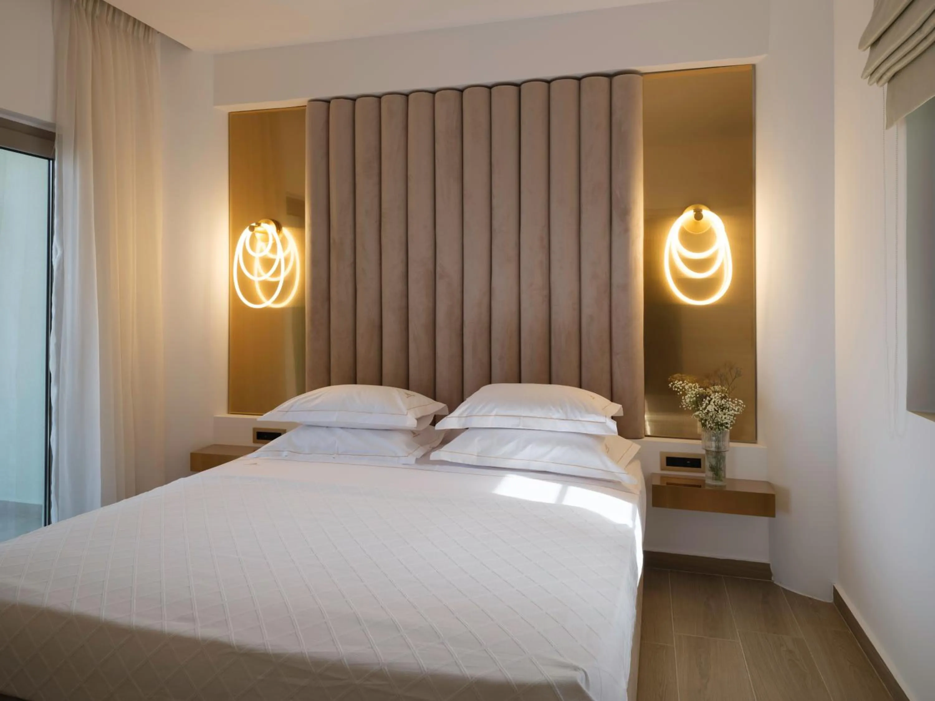 Bed in Golden Luxury Suites