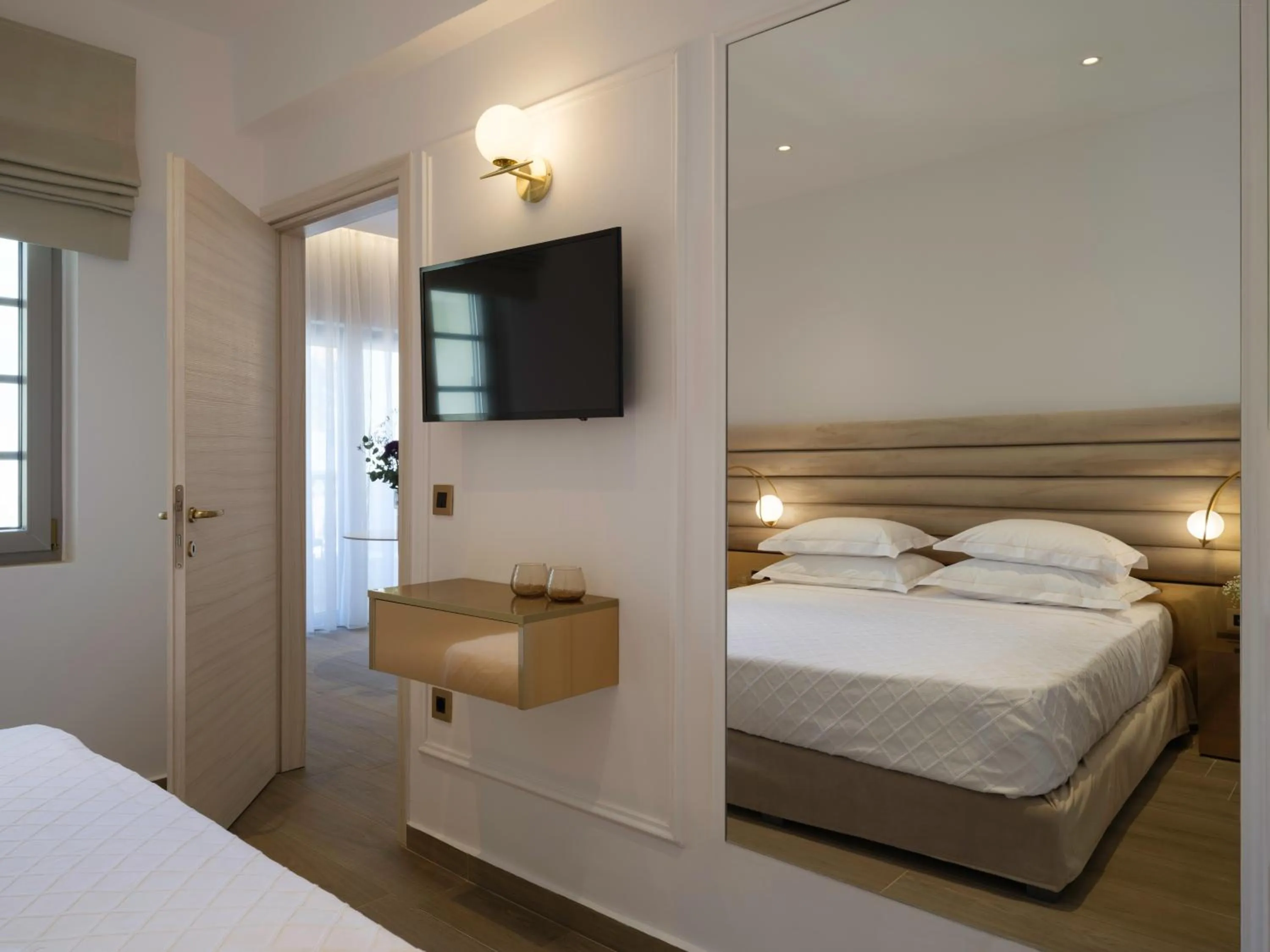 Bed in Golden Luxury Suites