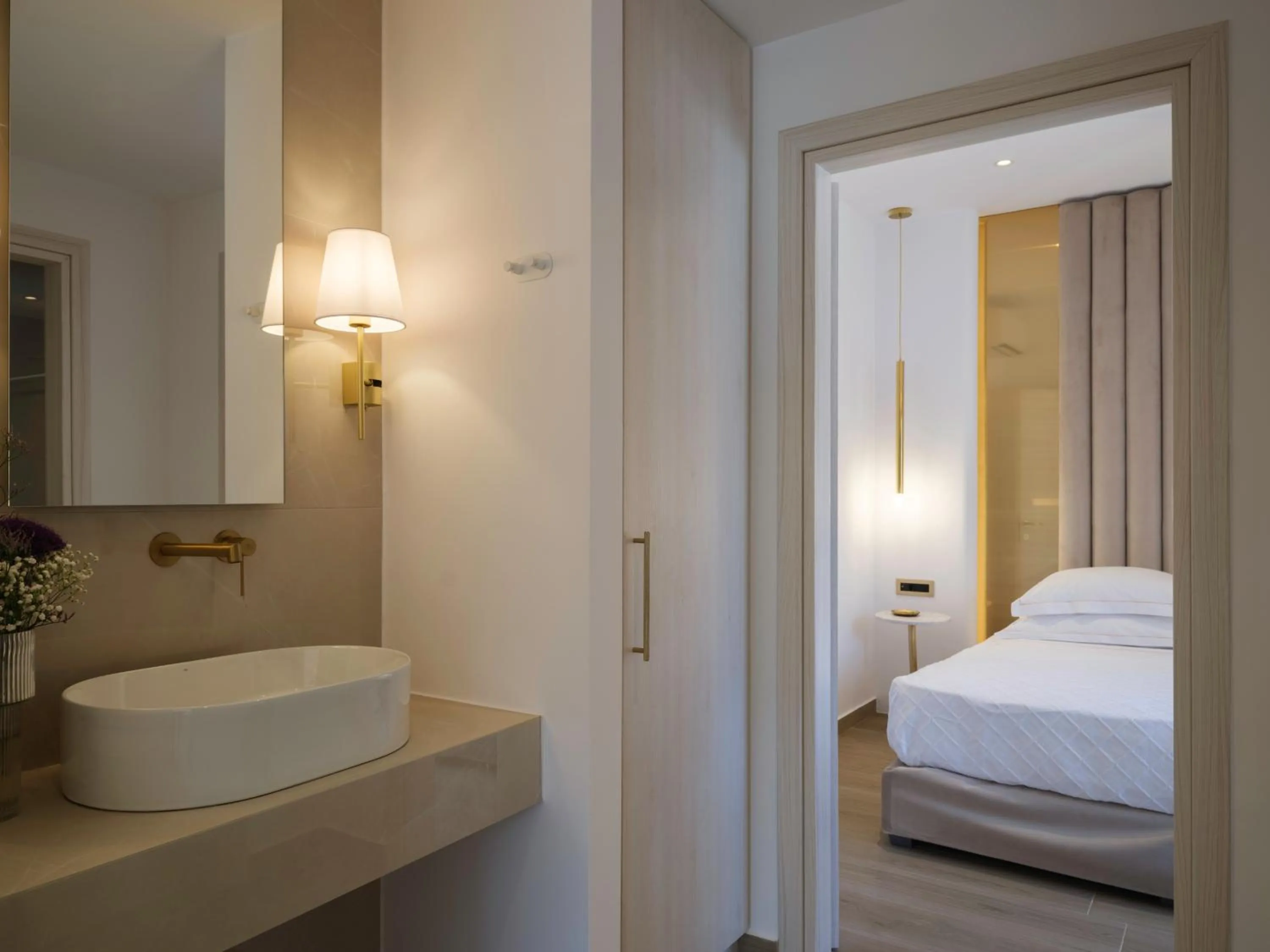 Bed in Golden Luxury Suites