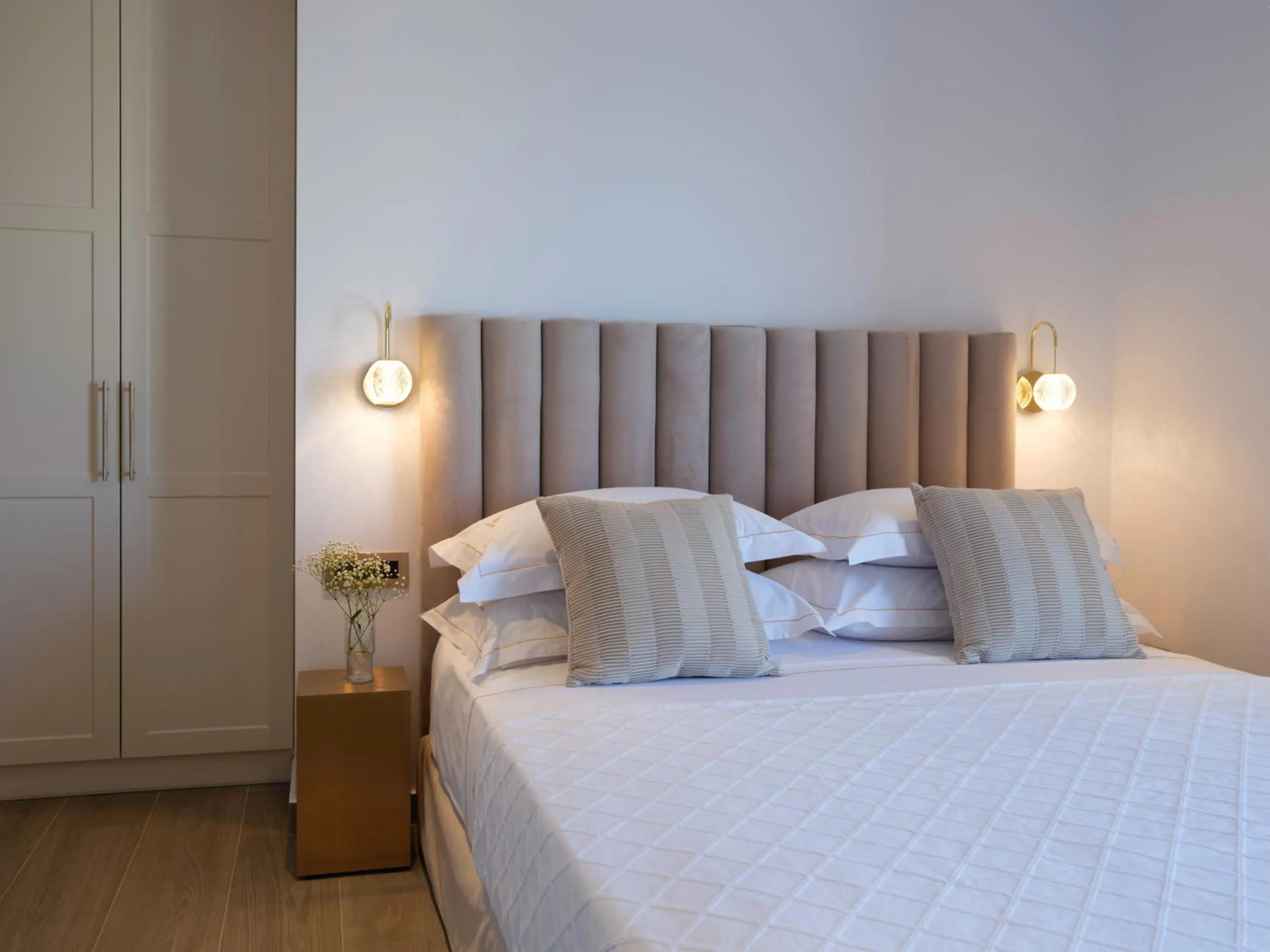 Bed in Golden Luxury Suites