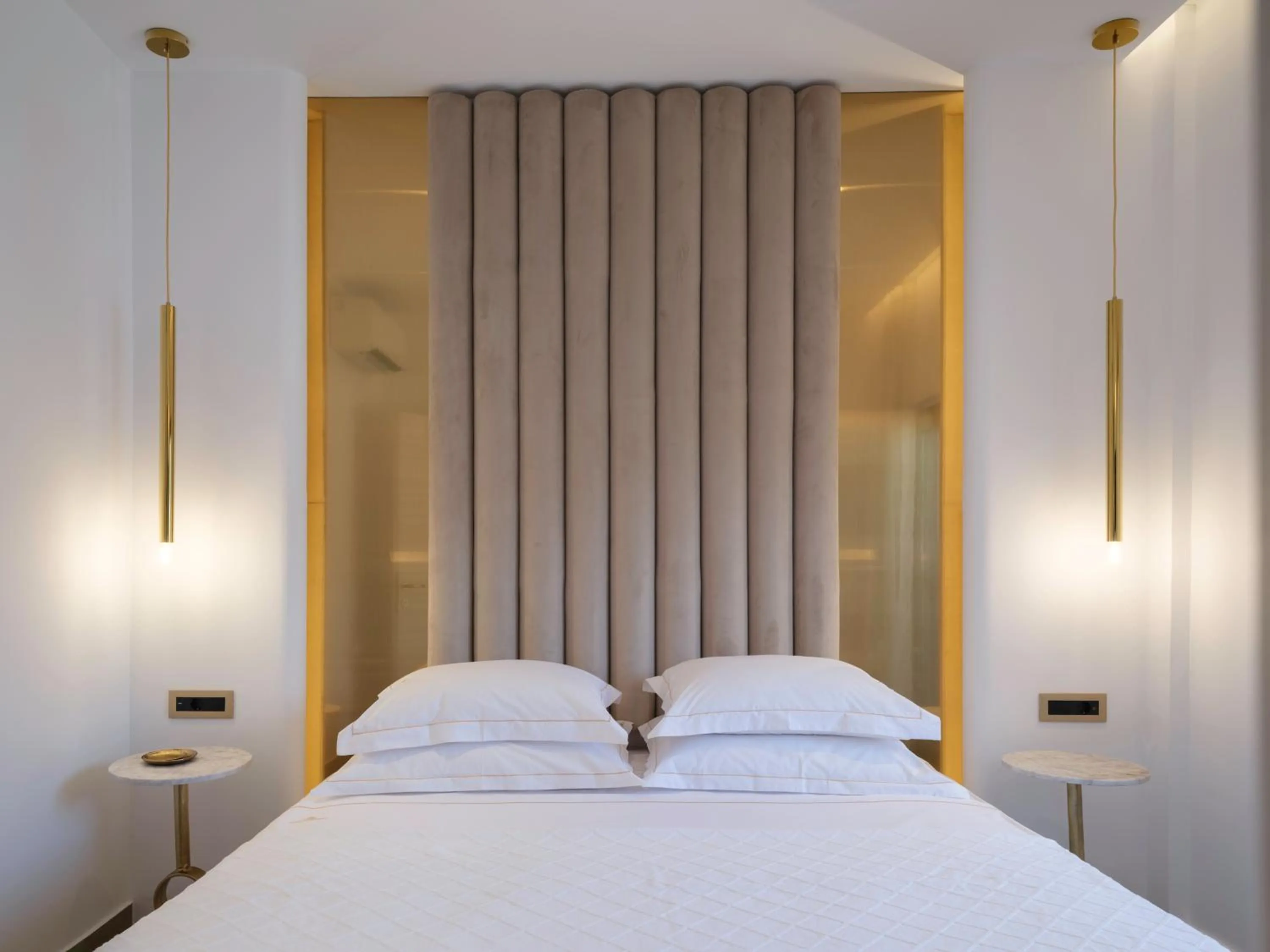 Bed in Golden Luxury Suites