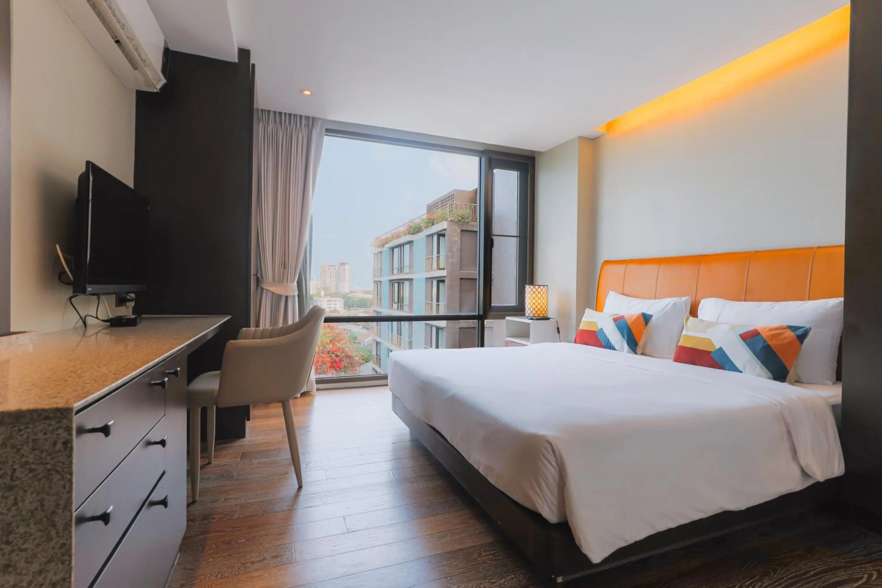 Bed in Balcony Courtyard Sriracha Hotel & Serviced Apartments