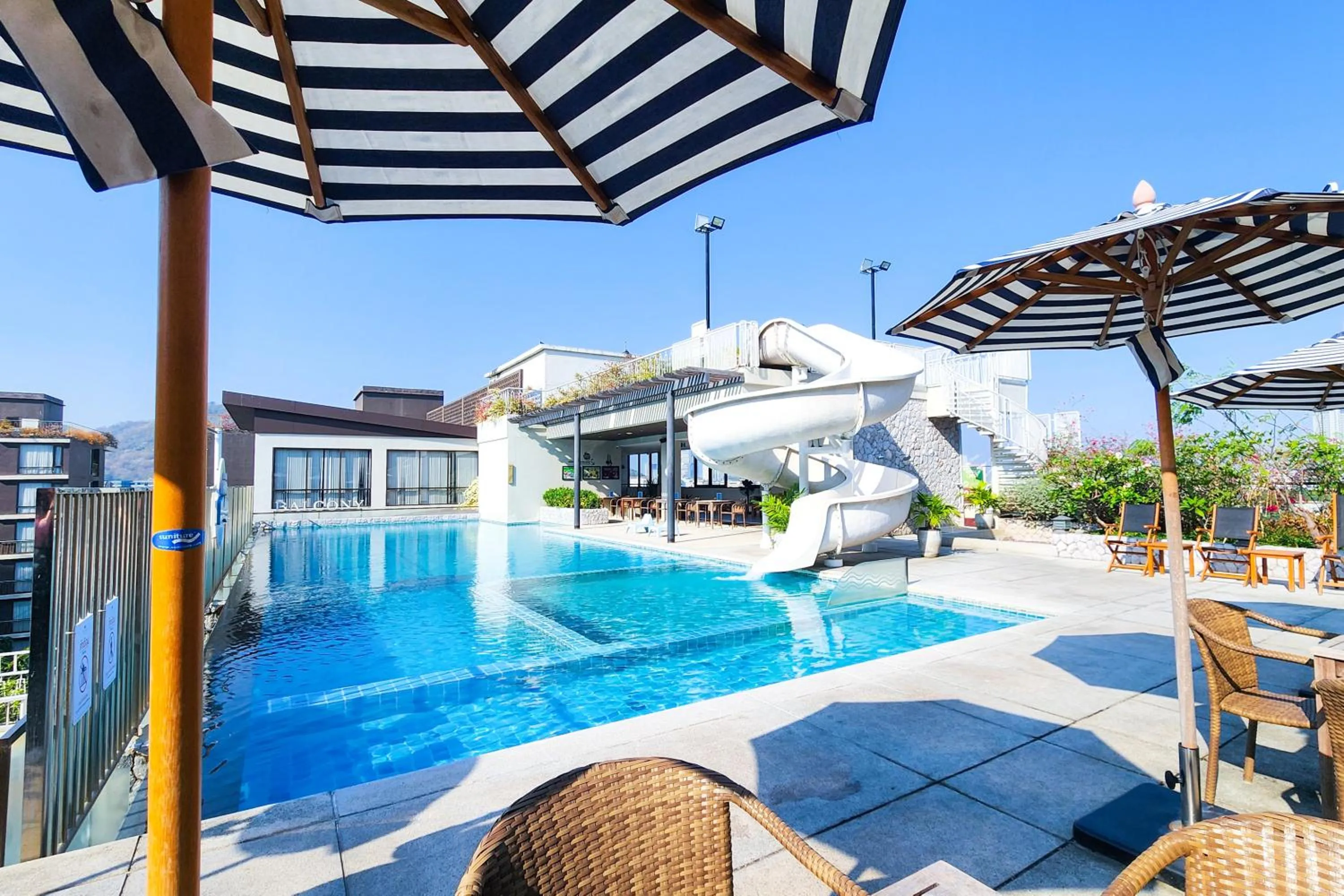 Swimming pool in Balcony Courtyard Sriracha Hotel & Serviced Apartments