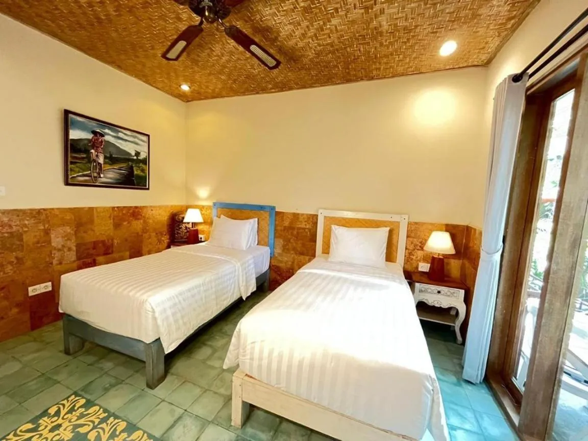 Bed in Jukung Guest House