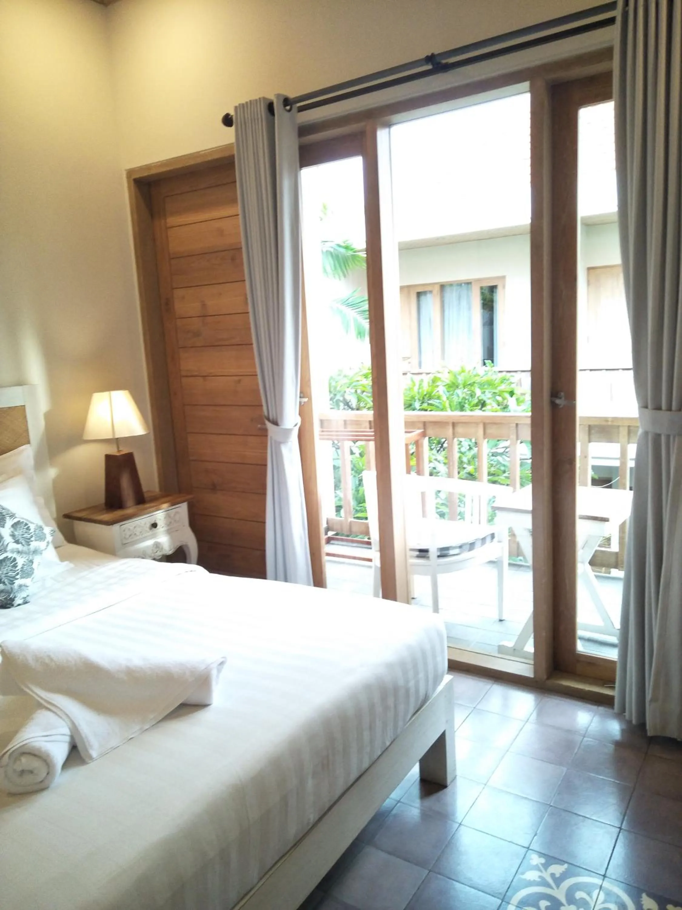 Balcony/Terrace, Bed in Jukung Guest House