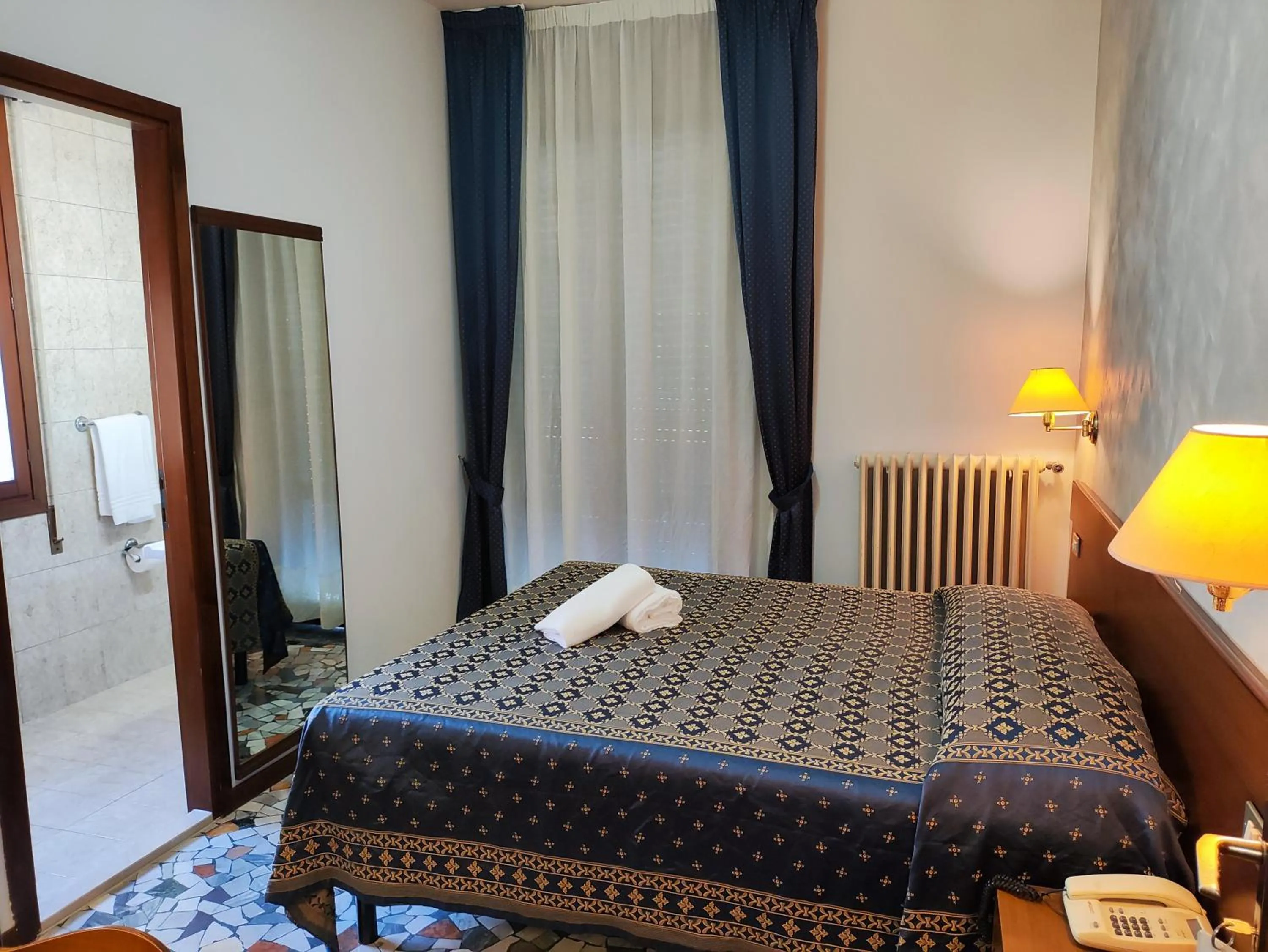 Bed in Hotel Firenze