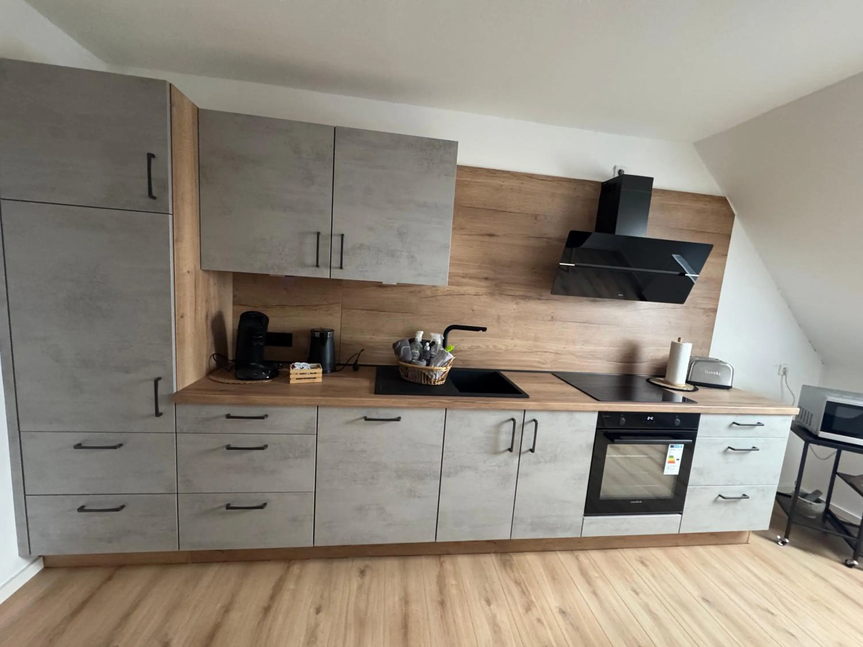 Kitchen or kitchenette in Pension und Apartment Landhaus Fricke