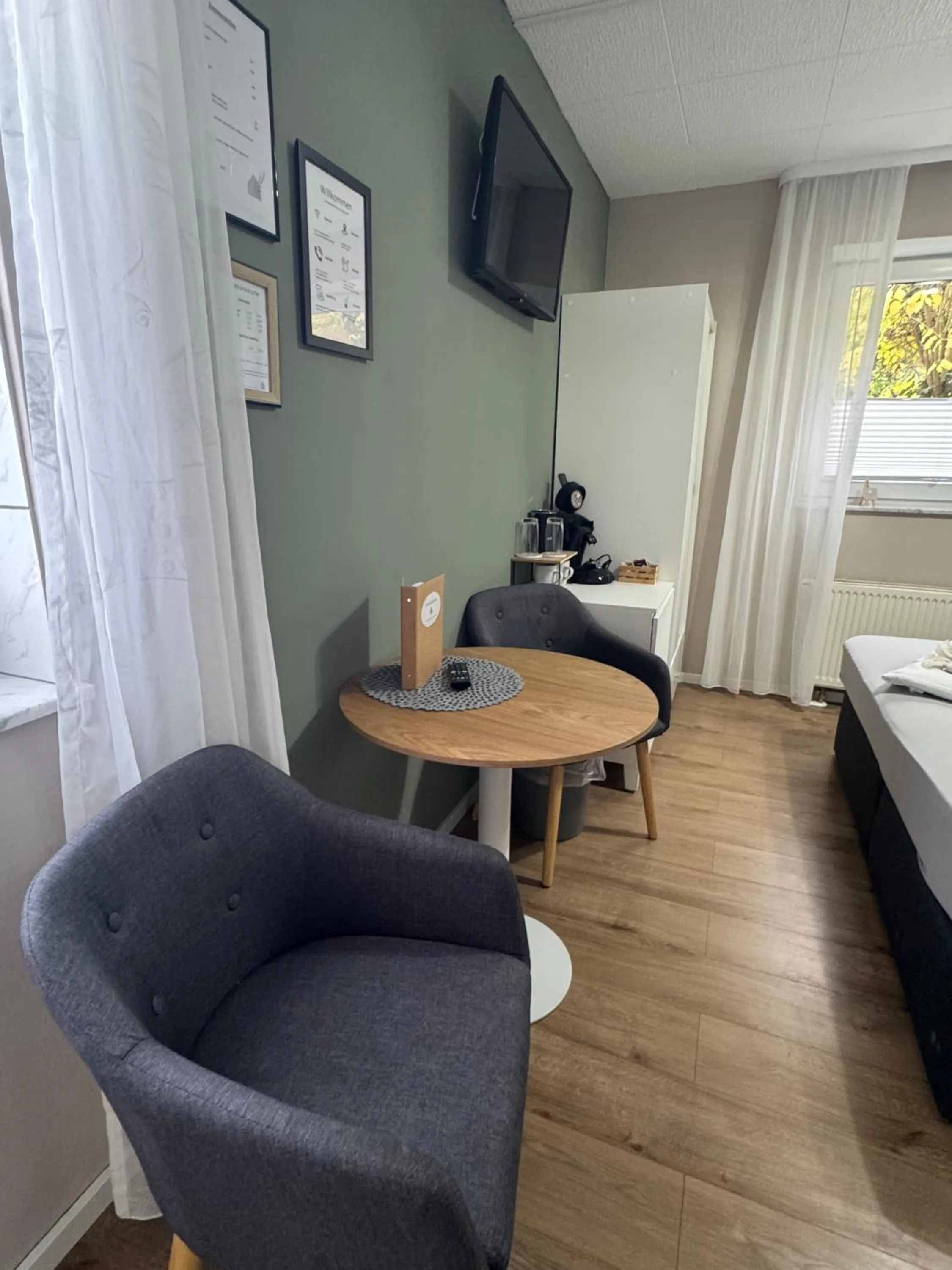 TV and multimedia, Bed in Pension und Apartment Landhaus Fricke