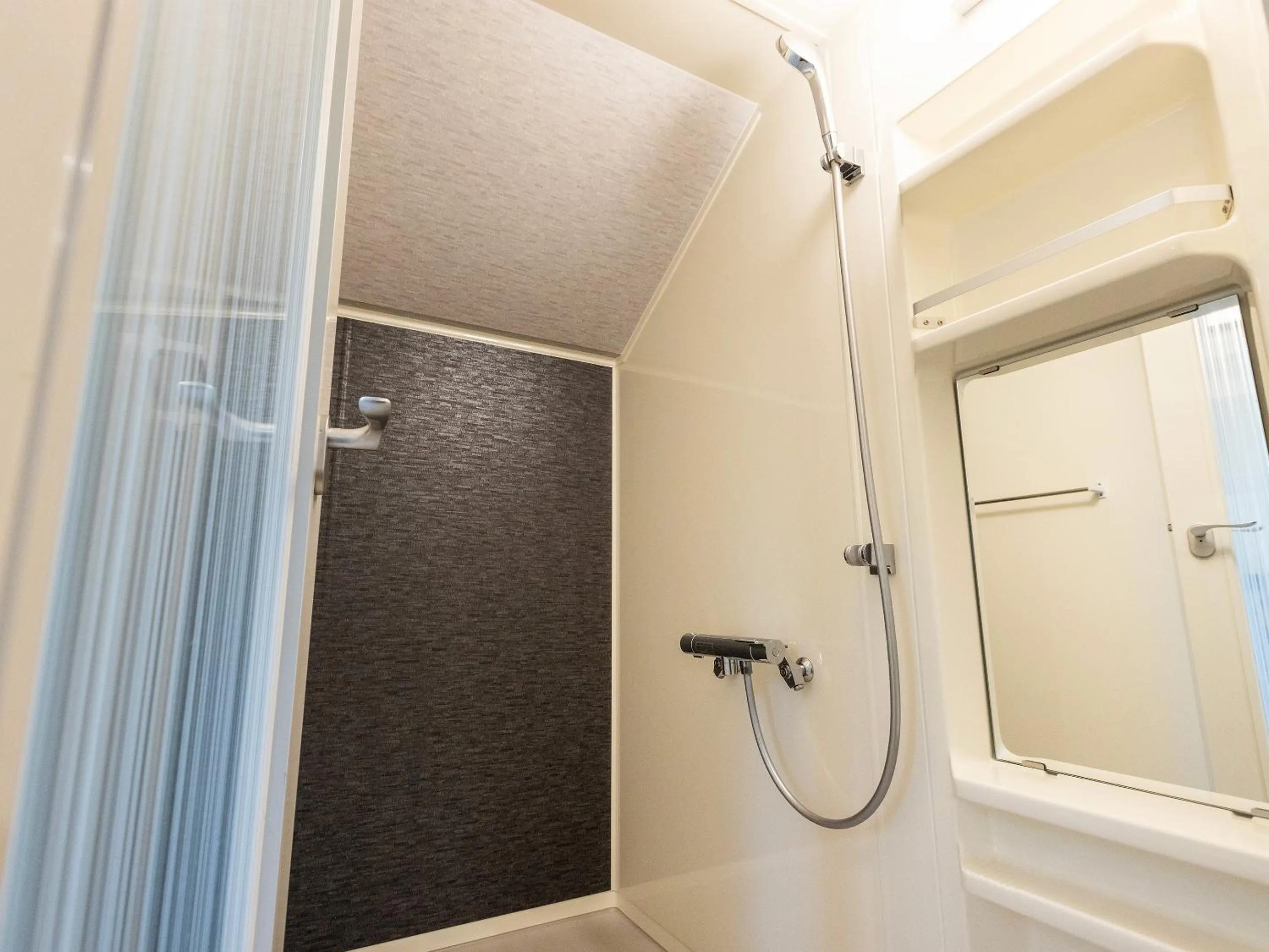 Shower in Tokachi Nakasatsunai Glamping Resort Feriendorf