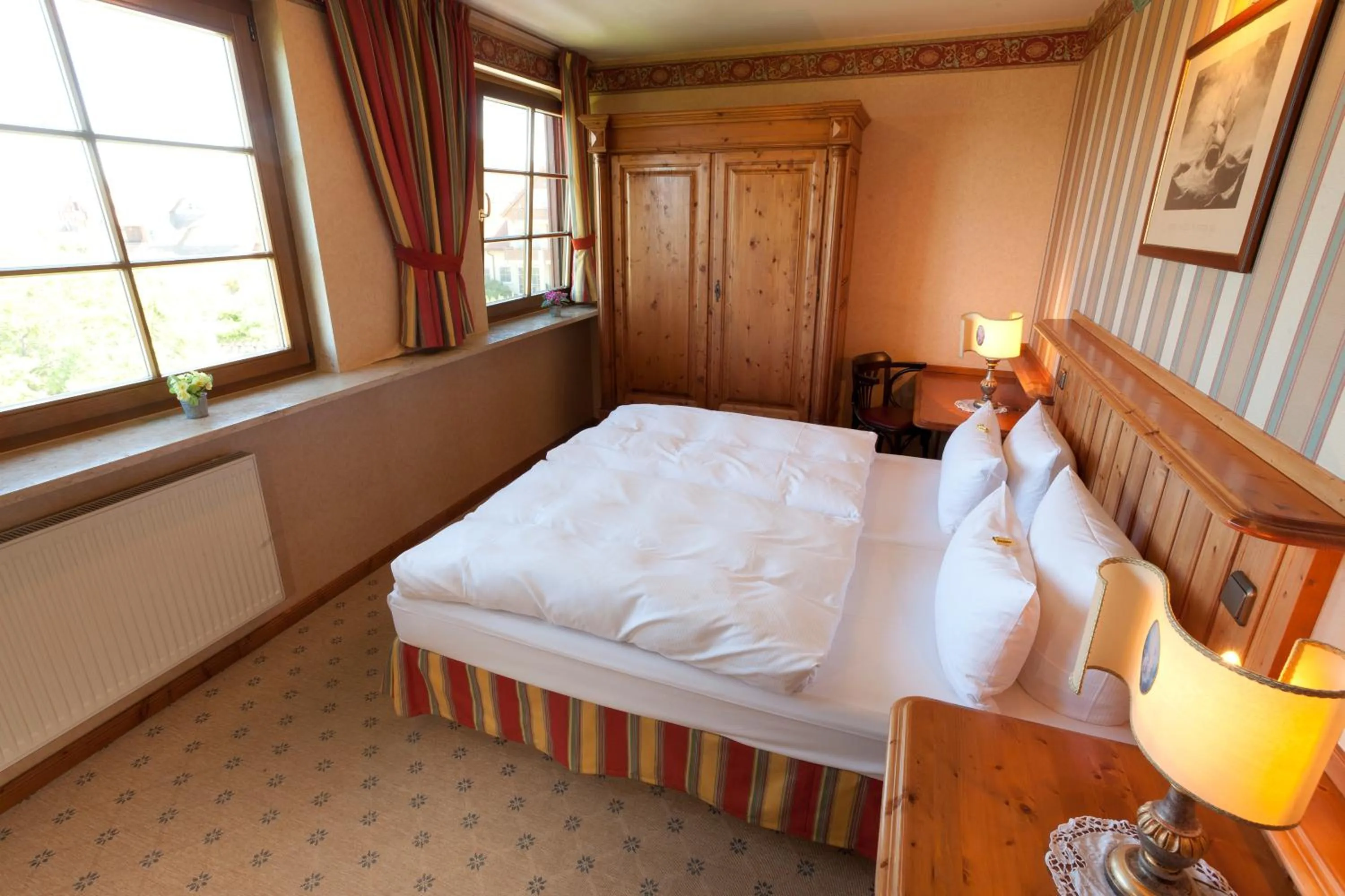 Bed in Moby Dick Hotel & Ferienwohnungen