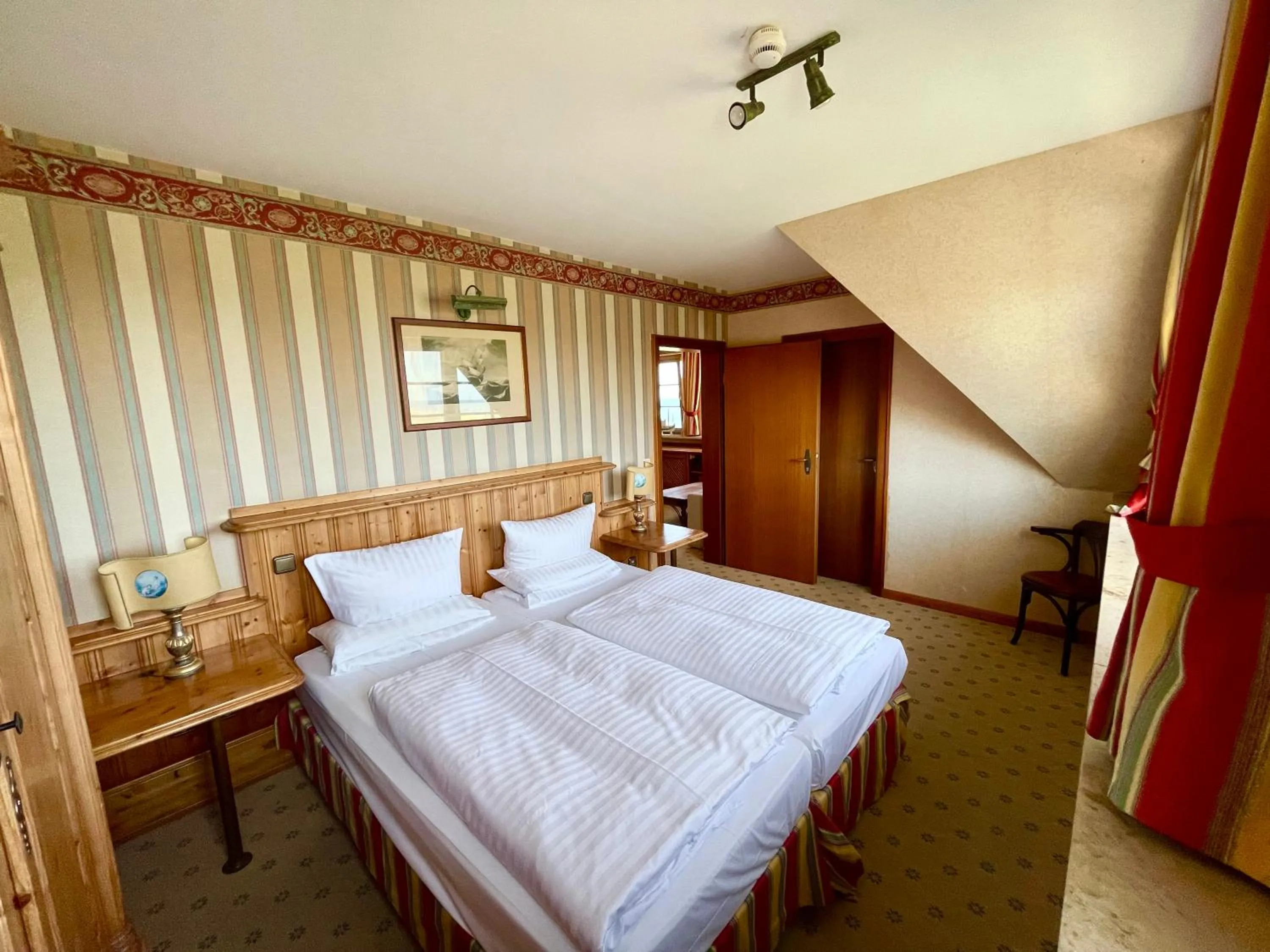 Bedroom, Bed in Moby Dick Hotel & Ferienwohnungen