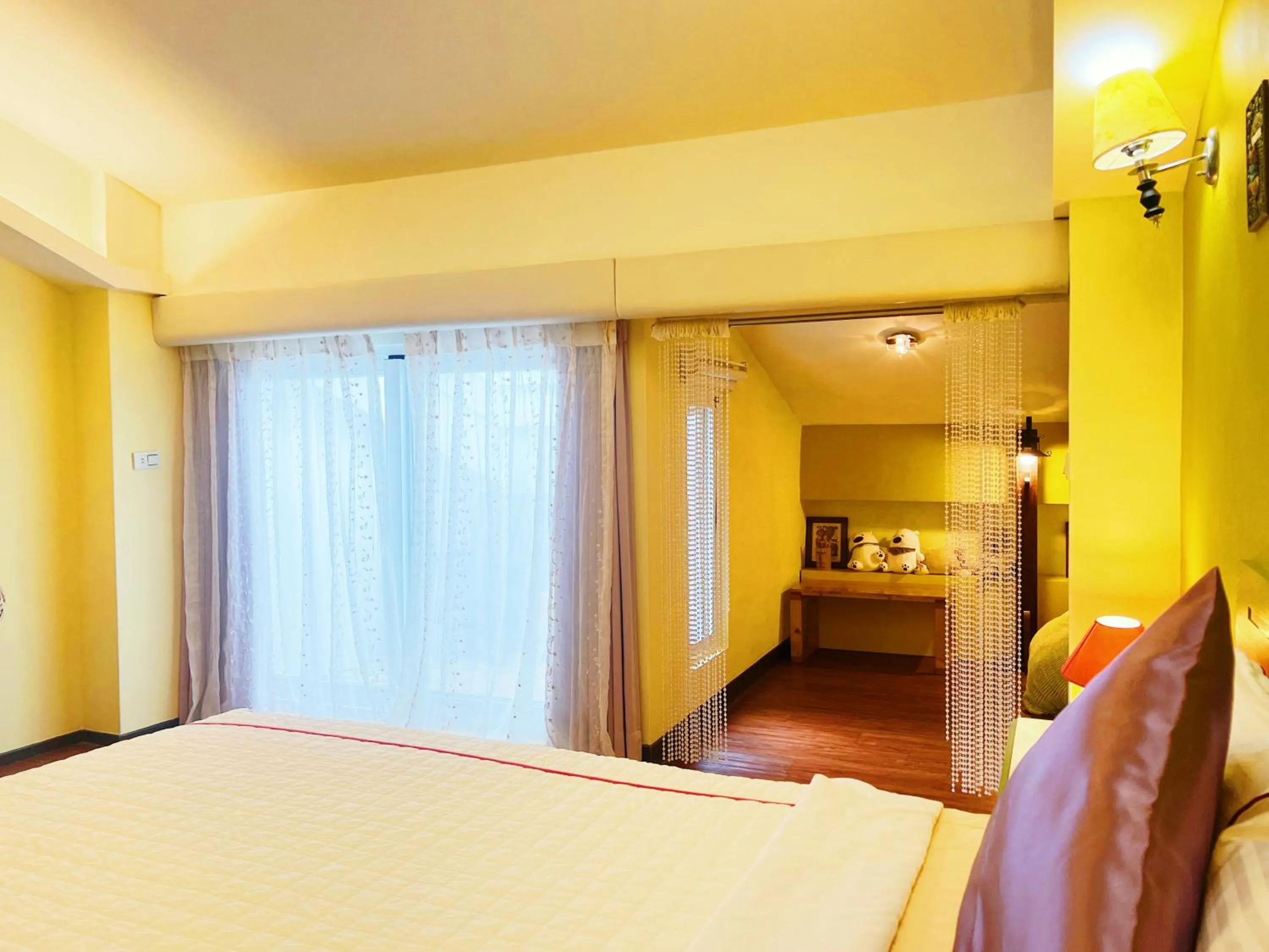 Balcony/Terrace, Bed in 墾丁茉莉民宿