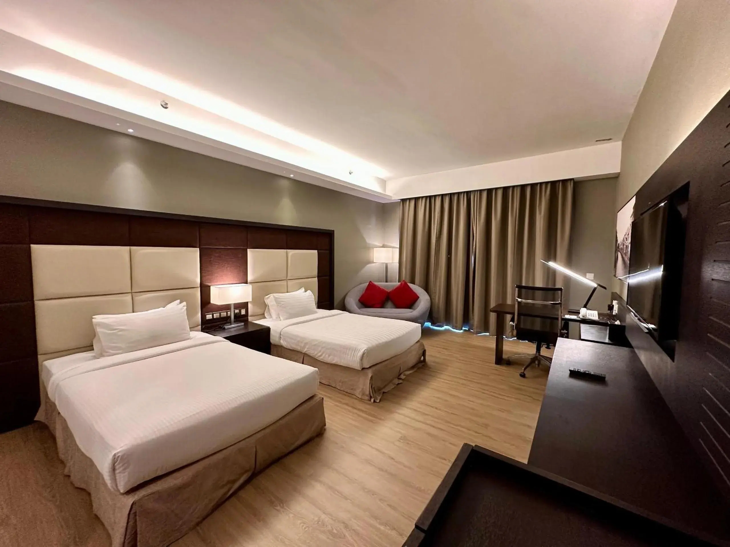 Communal lounge/ TV room, Bed in Swiss-Garden Hotel Melaka Communal lounge/ TV room, Bed in Swiss-Garden Hotel Melaka