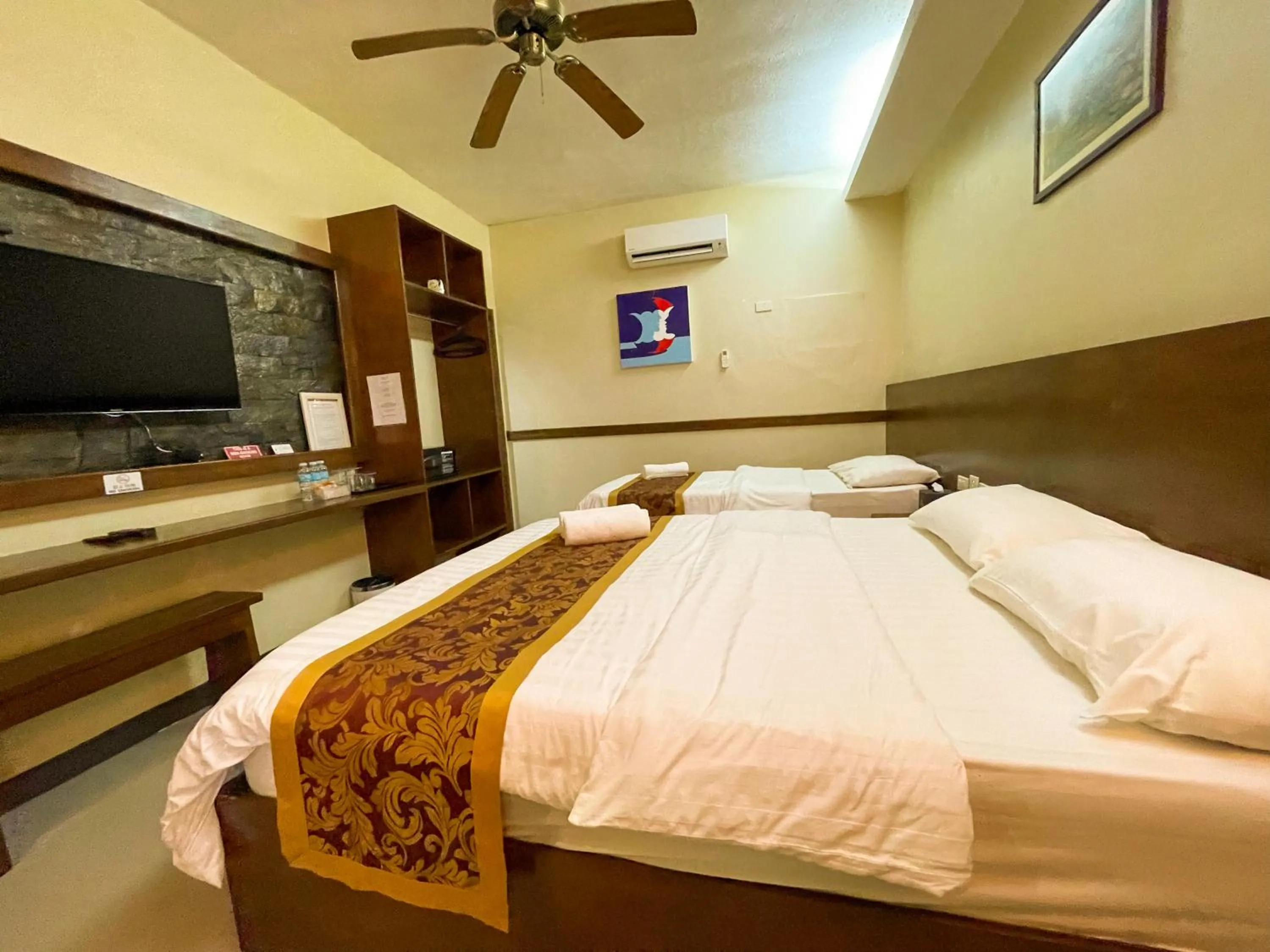 Bed in Casa Marco Suites Puerto Galera powered by Cocotel