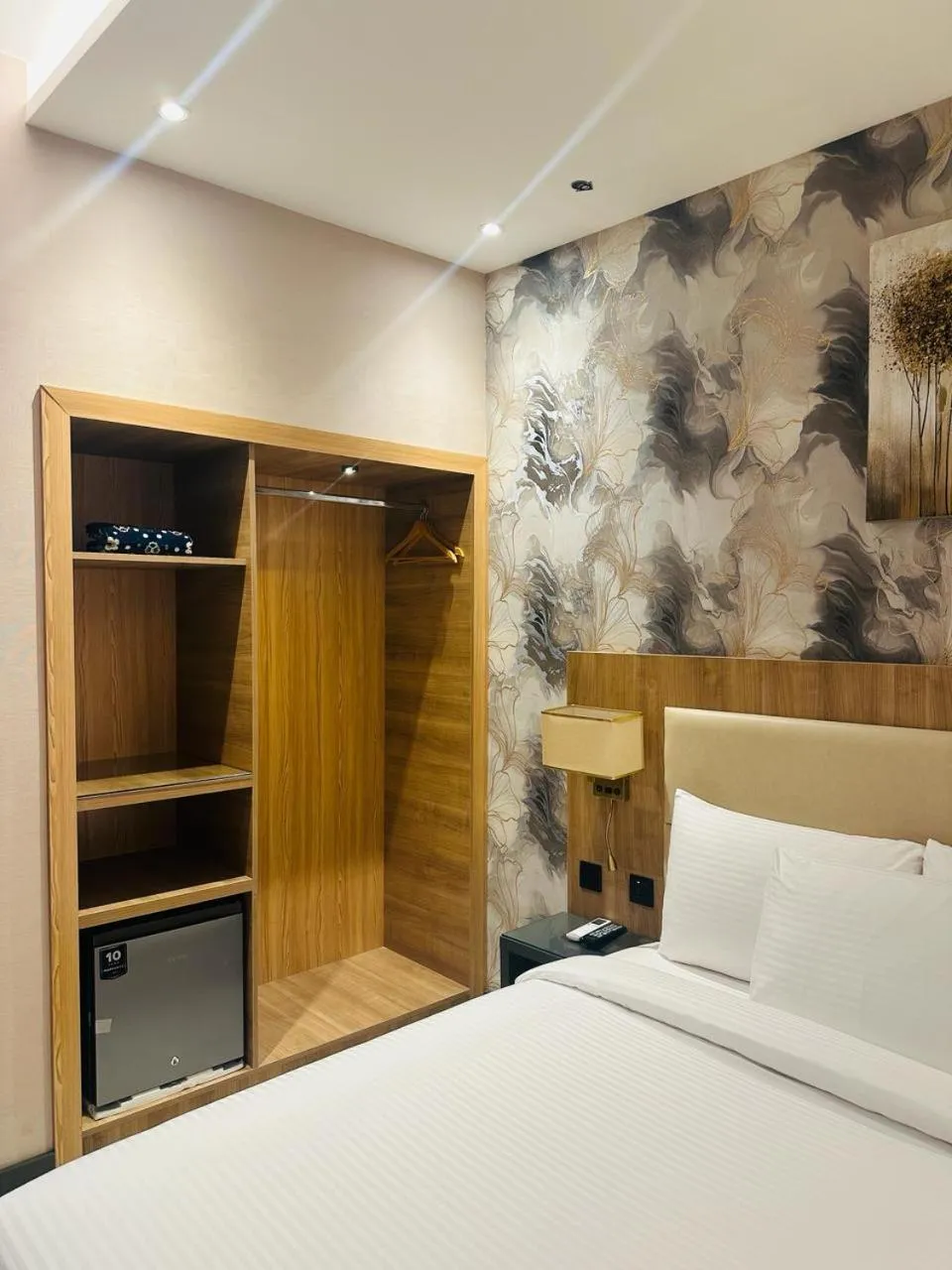 wardrobe, Bed in SKY PARK HOTEL