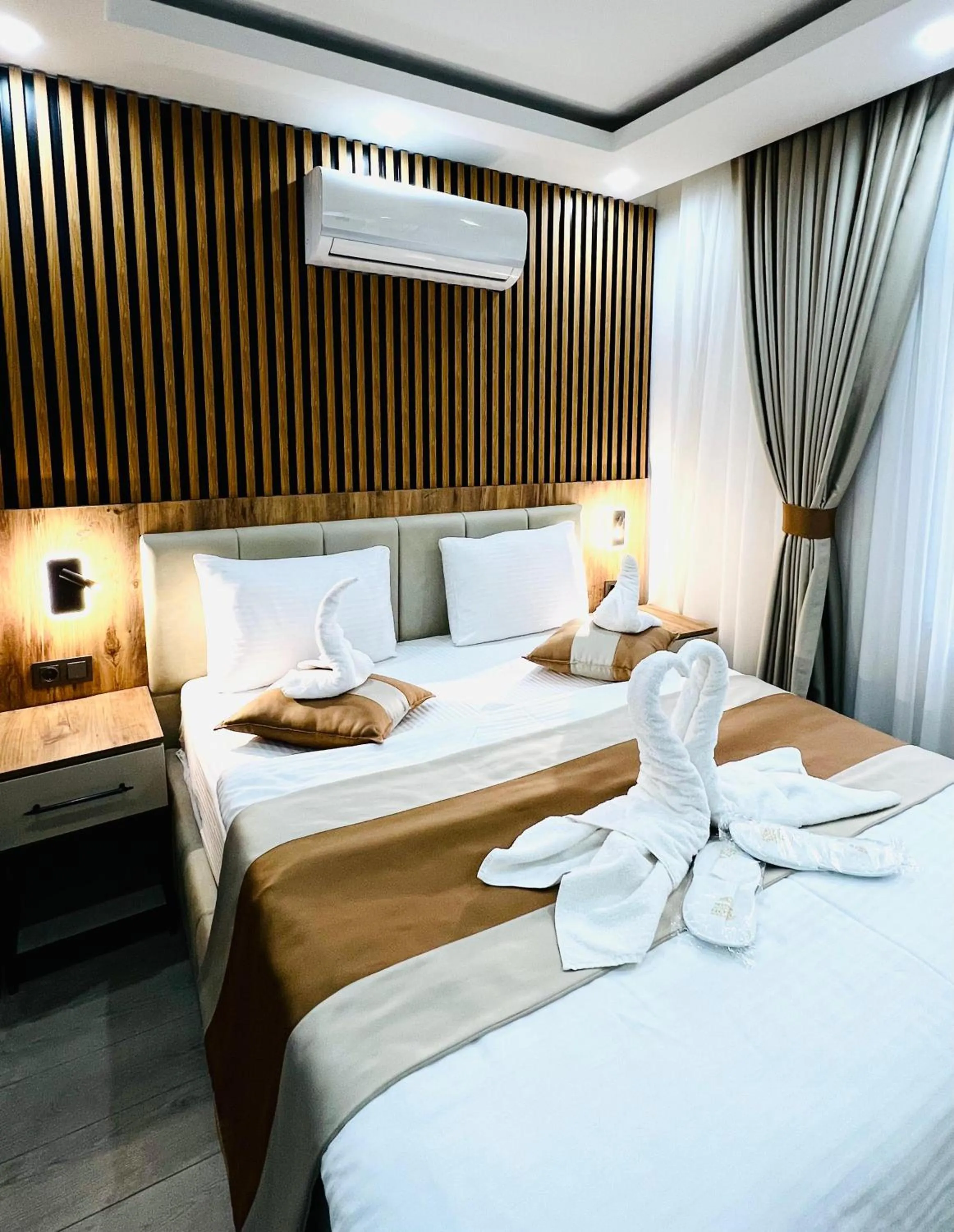 Bed in Ninova Boutique Hotel