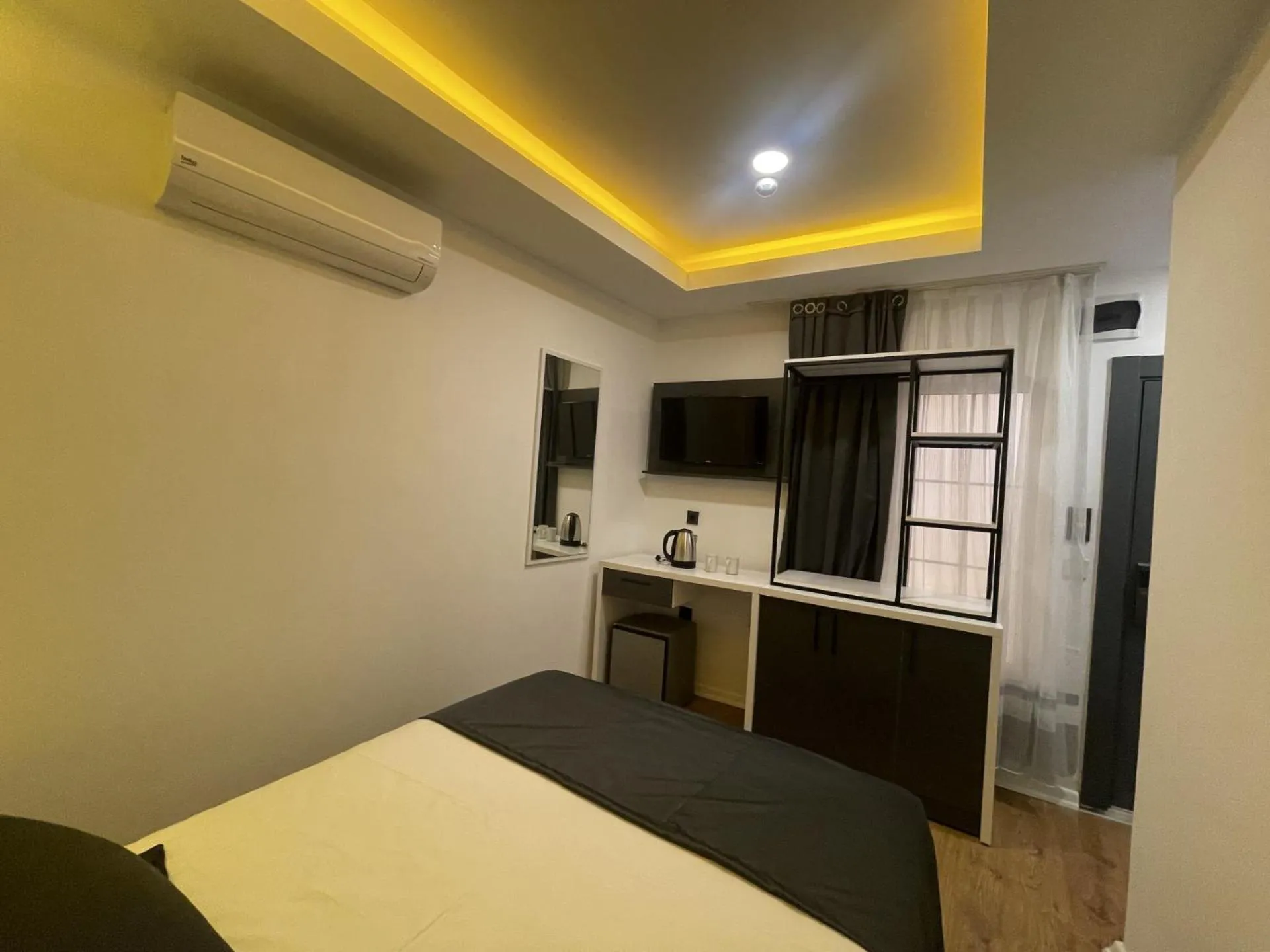 Bed in Mi Hotel Boutique