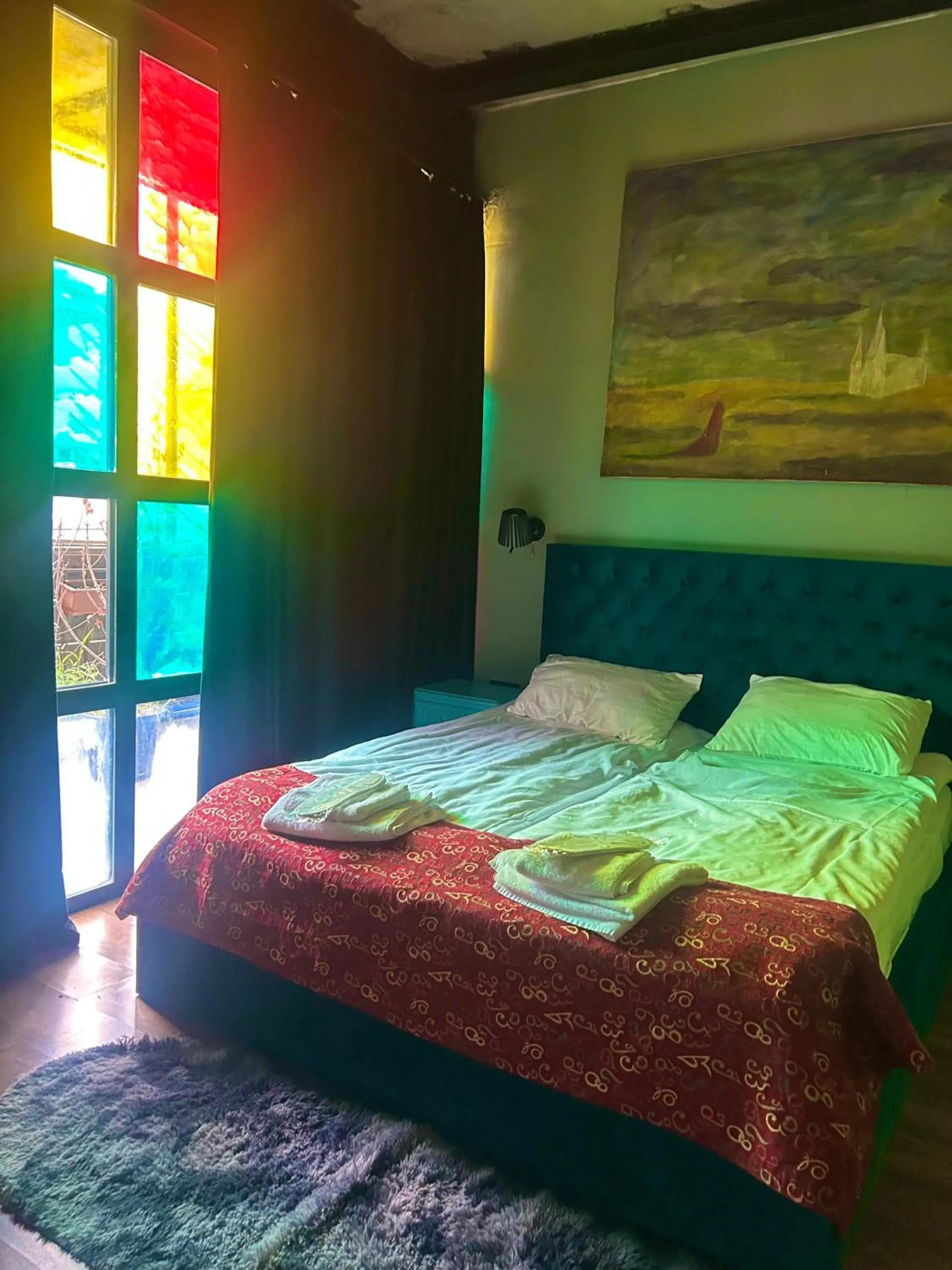 Bed in Art Hotel Home
